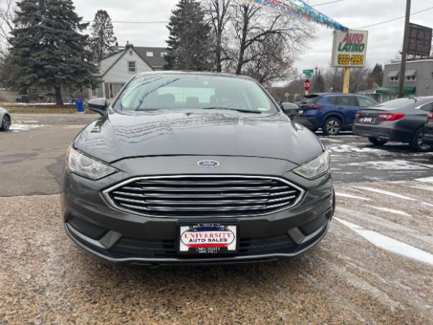 2018 Magnetic Metallic Ford Fusion SE (3FA6P0H74JR) with an 2.5L L4 DOHC 16V engine, 6-Speed Automatic transmission, located at 745 S Robert St, St. Paul, MN, 55107, (651) 222-2991, 44.923389, -93.081215 - Photo#0