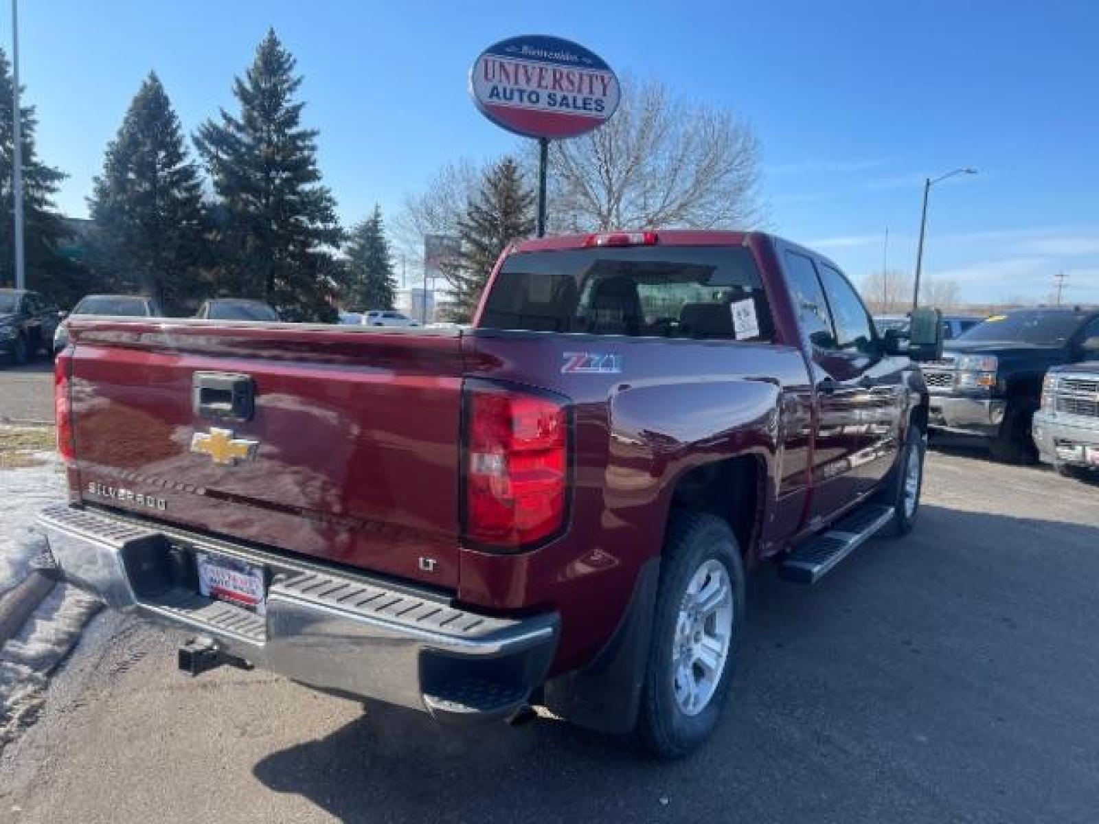2014 Victory Red Chevrolet Silverado 1500 1LT Double Cab 4WD (1GCVKREC1EZ) with an 5.3L V8 OHV 16V engine, 6-Speed Automatic transmission, located at 3301 W Hwy 13, Burnsville, MN, 55337, (952) 460-3200, 44.775333, -93.320808 - Photo #3