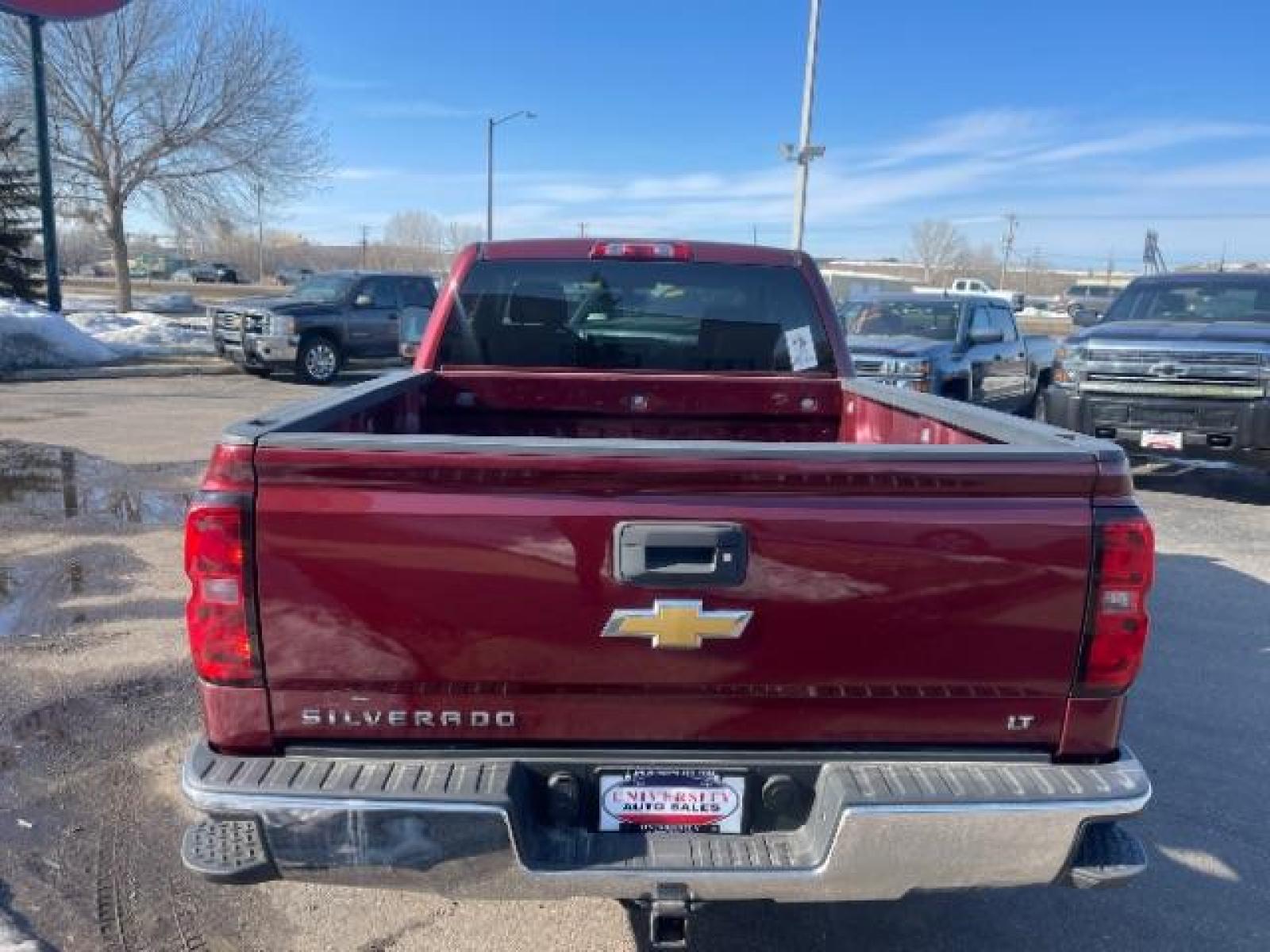 2014 Victory Red Chevrolet Silverado 1500 1LT Double Cab 4WD (1GCVKREC1EZ) with an 5.3L V8 OHV 16V engine, 6-Speed Automatic transmission, located at 3301 W Hwy 13, Burnsville, MN, 55337, (952) 460-3200, 44.775333, -93.320808 - Photo #4