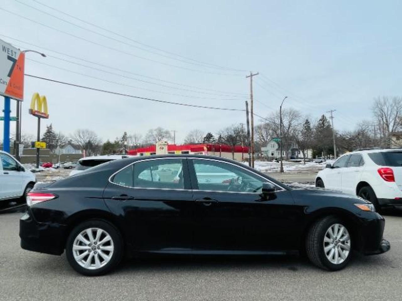 2020 Midnight Black Metallic Toyota Camry LE (4T1C11AK9LU) with an 2.5L L4 DOHC 16V engine, 8-Speed Automatic transmission, located at 834 West 7th Street, St. Paul, MN, 55102, (651) 797-6393, 44.930954, -93.121559 - Photo #0