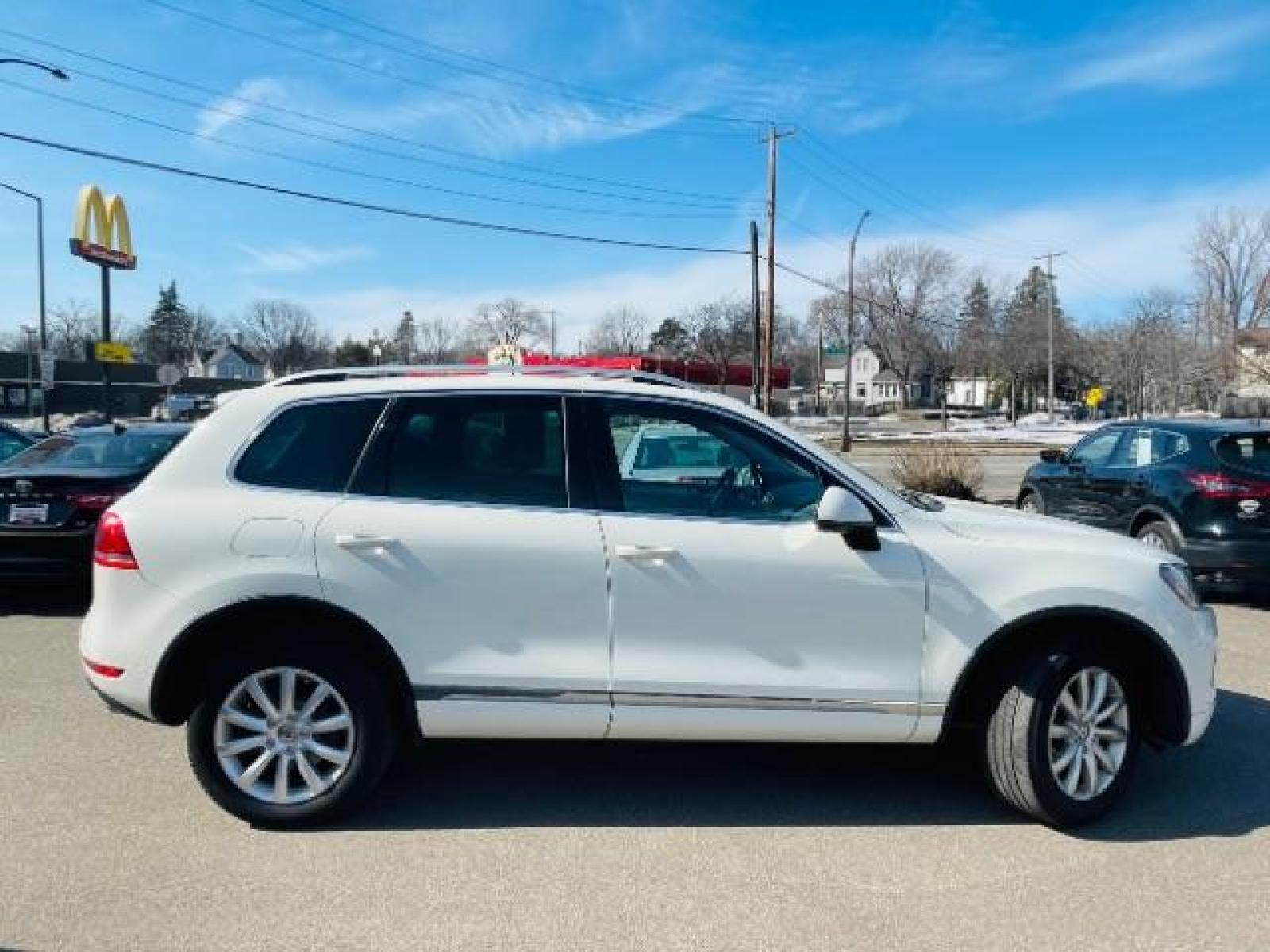 2012 Pure White Volkswagen Touareg TDI Sport w/Navigation (WVGFK9BP9CD) with an 3.0L V6 DOHC 24V TURBO DIESEL engine, 8-Speed Automatic transmission, located at 745 S Robert St, St. Paul, MN, 55107, (651) 222-2991, 44.923389, -93.081215 - Photo #0