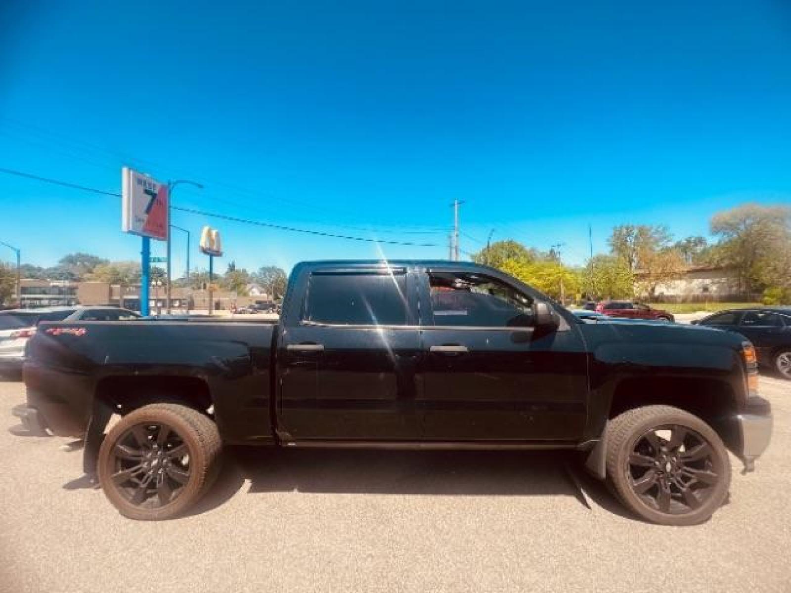 2014 Black Chevrolet Silverado 1500 1LT Crew Cab 4WD (3GCUKREC6EG) with an 5.3L V8 OHV 16V engine, 6-Speed Automatic transmission, located at 745 S Robert St, St. Paul, MN, 55107, (651) 222-2991, 44.923389, -93.081215 - Photo #4
