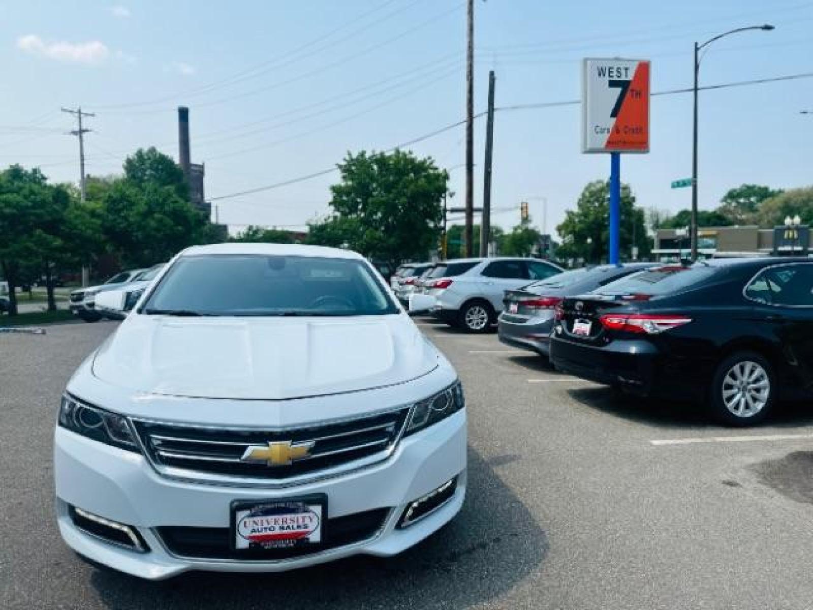 2019 Summit White Chevrolet Impala LT (2G11Z5S33K9) with an 3.6L V6 DOHC 24V engine, 6-Speed Automatic transmission, located at 834 West 7th Street, St. Paul, MN, 55102, (651) 797-6393, 44.930954, -93.121559 - Photo #0