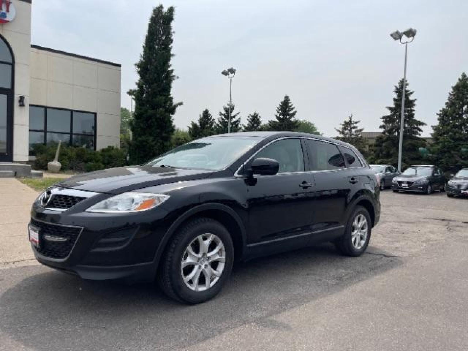 2012 Brilliant Black Clearcoat Mazda CX-9 Touring AWD (JM3TB3CA9C0) with an 3.7L V6 DOHC 24V engine, 6-Speed Automatic transmission, located at 745 S Robert St, St. Paul, MN, 55107, (651) 222-2991, 44.923389, -93.081215 - Photo #3