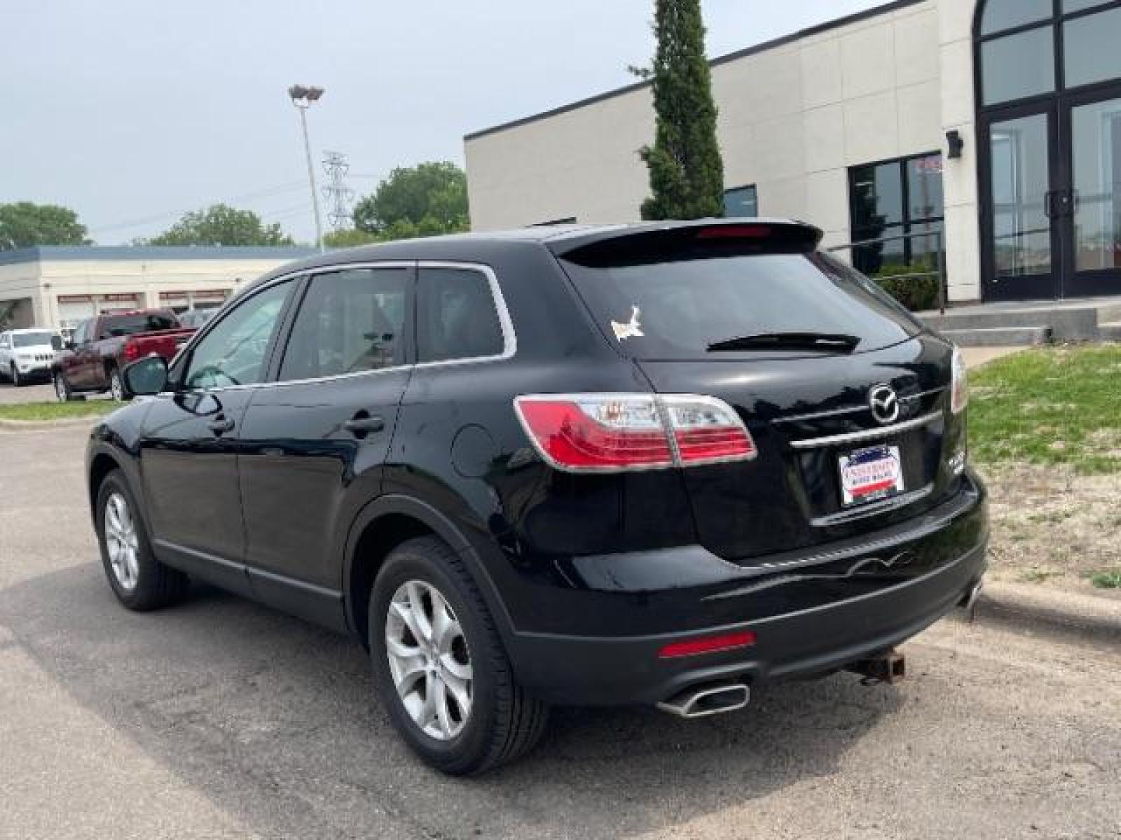 2012 Brilliant Black Clearcoat Mazda CX-9 Touring AWD (JM3TB3CA9C0) with an 3.7L V6 DOHC 24V engine, 6-Speed Automatic transmission, located at 745 S Robert St, St. Paul, MN, 55107, (651) 222-2991, 44.923389, -93.081215 - Photo #4