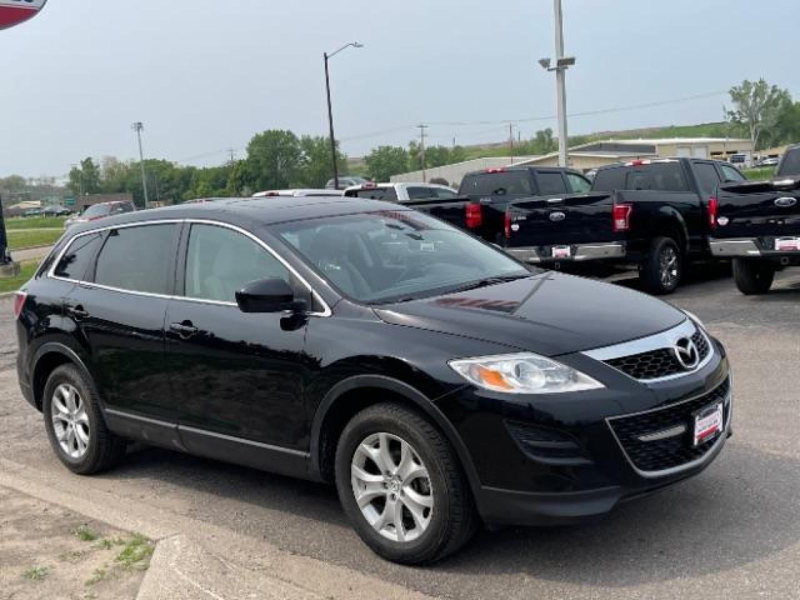2012 Brilliant Black Clearcoat Mazda CX-9 Touring AWD (JM3TB3CA9C0) with an 3.7L V6 DOHC 24V engine, 6-Speed Automatic transmission, located at 745 S Robert St, St. Paul, MN, 55107, (651) 222-2991, 44.923389, -93.081215 - Photo #6