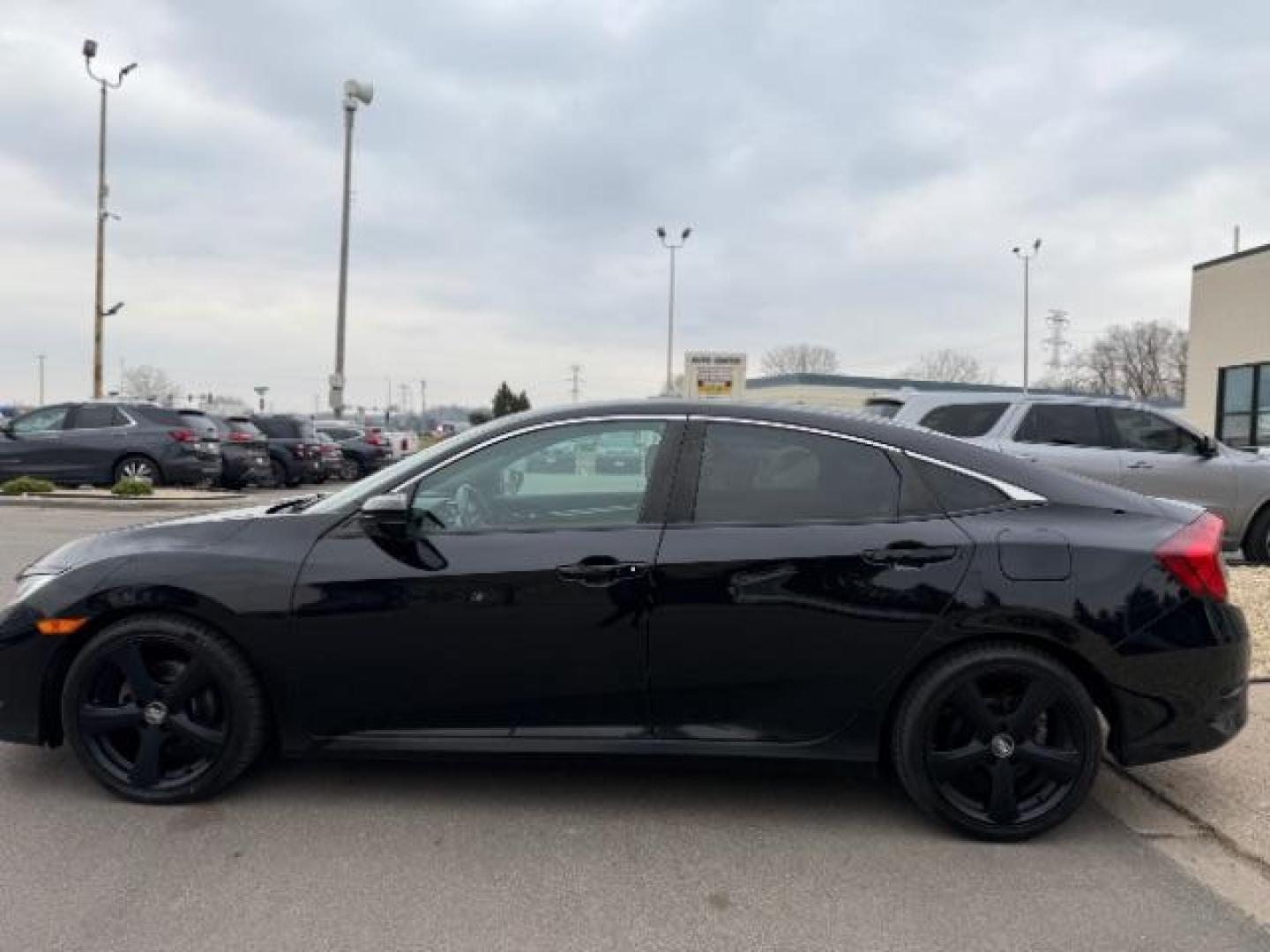 2019 Crystal Black Pearl Honda Civic Sport CVT (19XFC2F83KE) with an 2.0L L4 DOHC 16V engine, Continuously Variabl transmission, located at 3301 W Hwy 13, Burnsville, MN, 55337, (952) 460-3200, 44.775333, -93.320808 - Photo#1