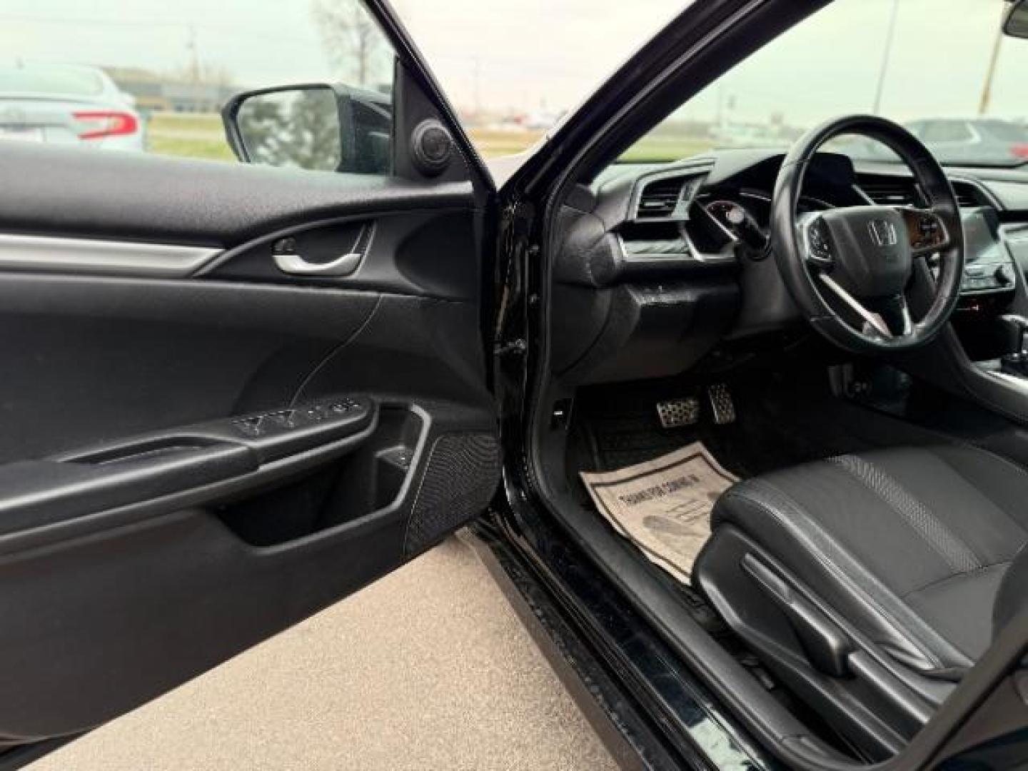 2019 Crystal Black Pearl Honda Civic Sport CVT (19XFC2F83KE) with an 2.0L L4 DOHC 16V engine, Continuously Variabl transmission, located at 3301 W Hwy 13, Burnsville, MN, 55337, (952) 460-3200, 44.775333, -93.320808 - Photo#7