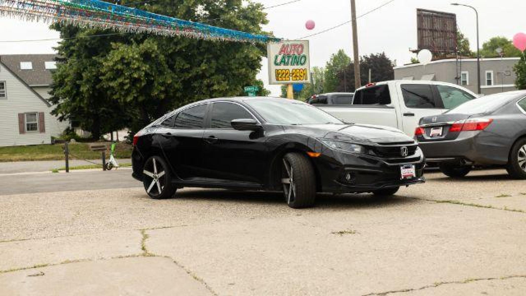 2019 Crystal Black Pearl Honda Civic Sport CVT (19XFC2F83KE) with an 2.0L L4 DOHC 16V engine, Continuously Variable Transmission transmission, located at 745 S Robert St, St. Paul, MN, 55107, (651) 222-2991, 44.923389, -93.081215 - Photo #0