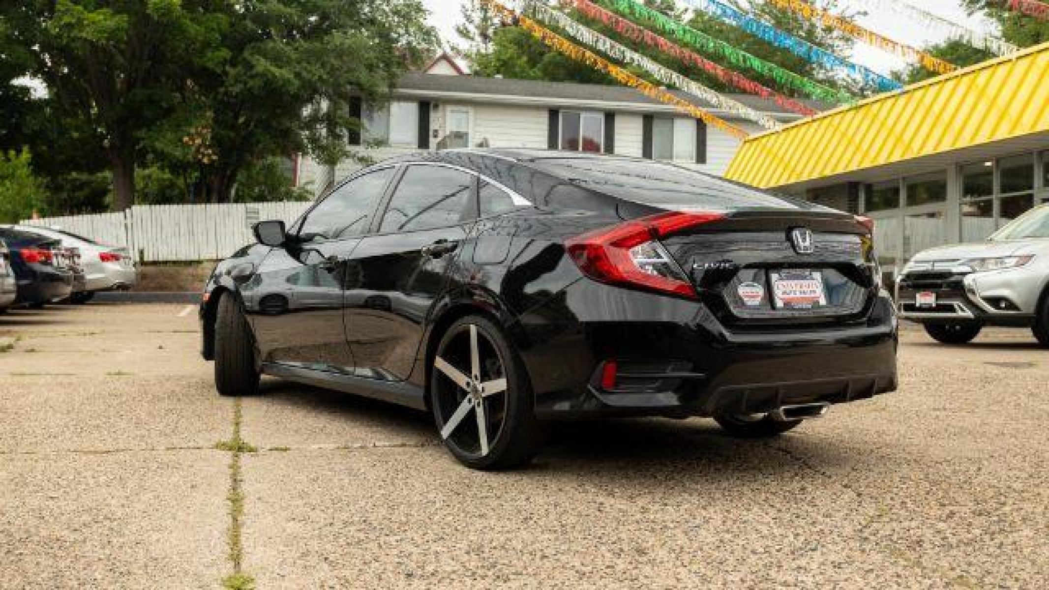 2019 Crystal Black Pearl Honda Civic Sport CVT (19XFC2F83KE) with an 2.0L L4 DOHC 16V engine, Continuously Variable Transmission transmission, located at 745 S Robert St, St. Paul, MN, 55107, (651) 222-2991, 44.923389, -93.081215 - Photo #2