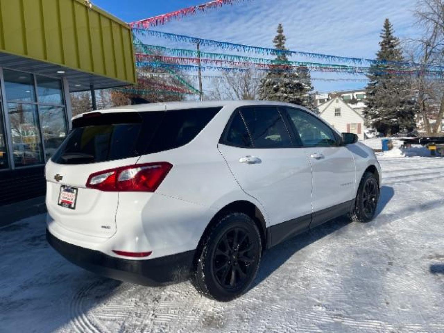 2019 Summit White Chevrolet Equinox LS 1.5 AWD (2GNAXSEVXK6) with an 1.5L L4 DIR DOHC 16V engine, 6-Speed Automatic transmission, located at 745 S Robert St, St. Paul, MN, 55107, (651) 222-2991, 44.923389, -93.081215 - Photo#4