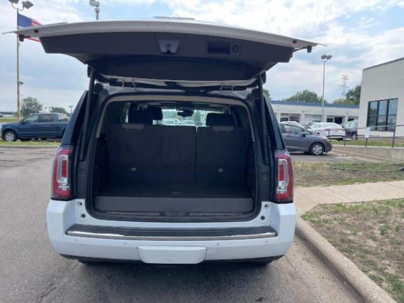 2016 Summit White GMC Yukon Denali 4WD (1GKS2CKJ7GR) with an 6.2L V8 OHV 16V engine, 6-Speed Automatic transmission, located at 745 S Robert St, St. Paul, MN, 55107, (651) 222-2991, 44.923389, -93.081215 - Photo #10