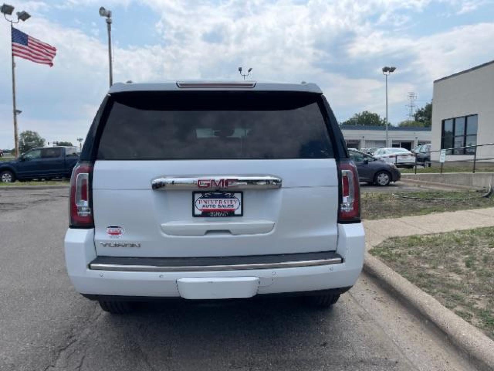 2016 Summit White GMC Yukon Denali 4WD (1GKS2CKJ7GR) with an 6.2L V8 OHV 16V engine, 6-Speed Automatic transmission, located at 745 S Robert St, St. Paul, MN, 55107, (651) 222-2991, 44.923389, -93.081215 - Photo #4