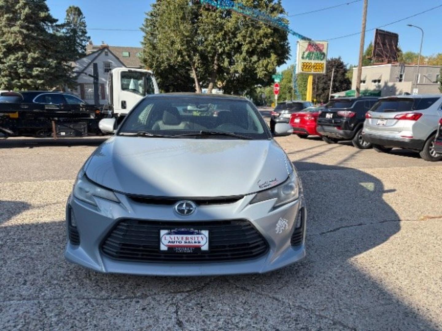 2014 Classic Silver Metal Scion tC Sports Coupe 6-Spd A (JTKJF5C78E3) with an 2.4L L4 DOHC 16V engine, 6-Speed Automatic transmission, located at 745 S Robert St, St. Paul, MN, 55107, (651) 222-2991, 44.923389, -93.081215- Photo#1