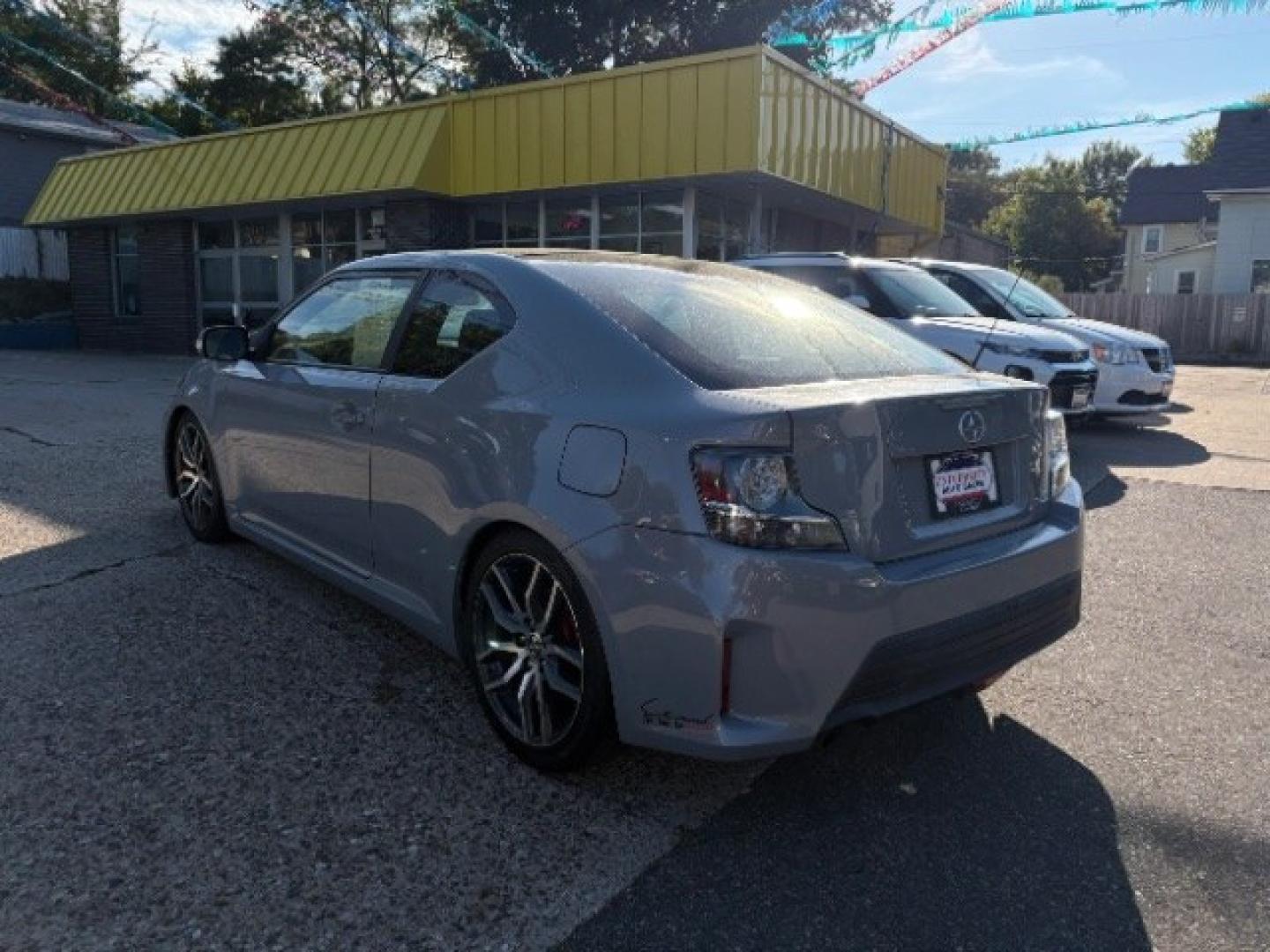 2014 Classic Silver Metal Scion tC Sports Coupe 6-Spd A (JTKJF5C78E3) with an 2.4L L4 DOHC 16V engine, 6-Speed Automatic transmission, located at 745 S Robert St, St. Paul, MN, 55107, (651) 222-2991, 44.923389, -93.081215- Photo#4