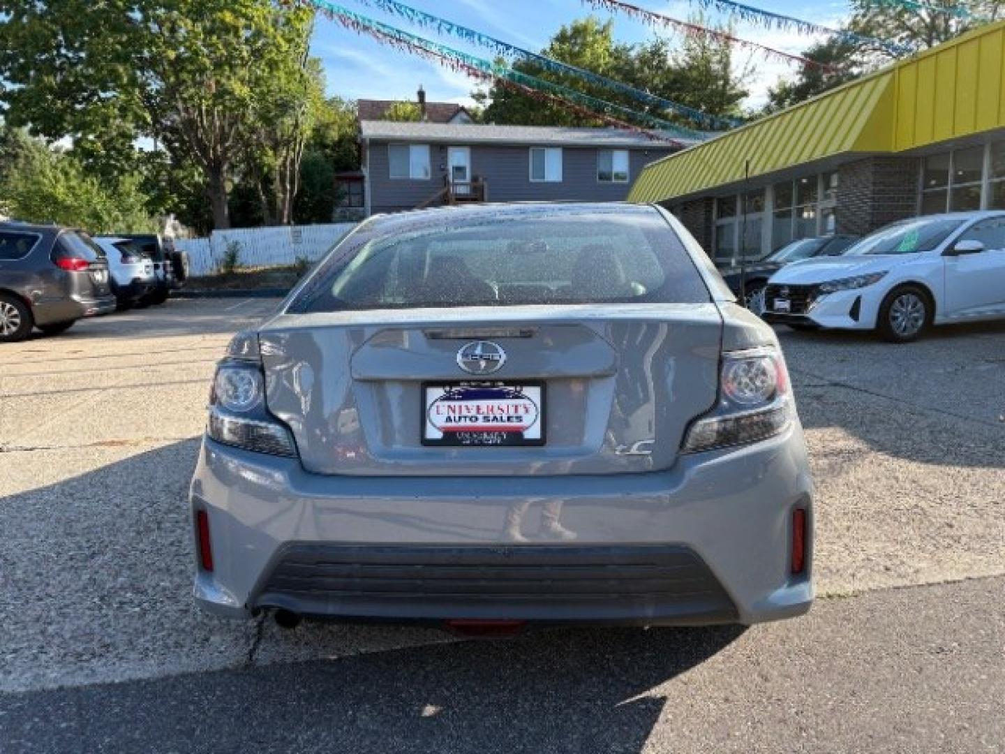 2014 Classic Silver Metal Scion tC Sports Coupe 6-Spd A (JTKJF5C78E3) with an 2.4L L4 DOHC 16V engine, 6-Speed Automatic transmission, located at 745 S Robert St, St. Paul, MN, 55107, (651) 222-2991, 44.923389, -93.081215- Photo#5