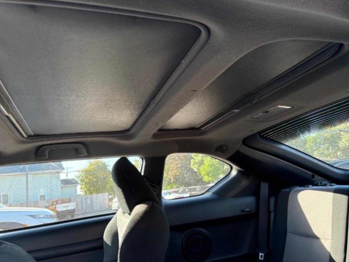 2014 Classic Silver Metal Scion tC Sports Coupe 6-Spd A (JTKJF5C78E3) with an 2.4L L4 DOHC 16V engine, 6-Speed Automatic transmission, located at 745 S Robert St, St. Paul, MN, 55107, (651) 222-2991, 44.923389, -93.081215- Photo#12