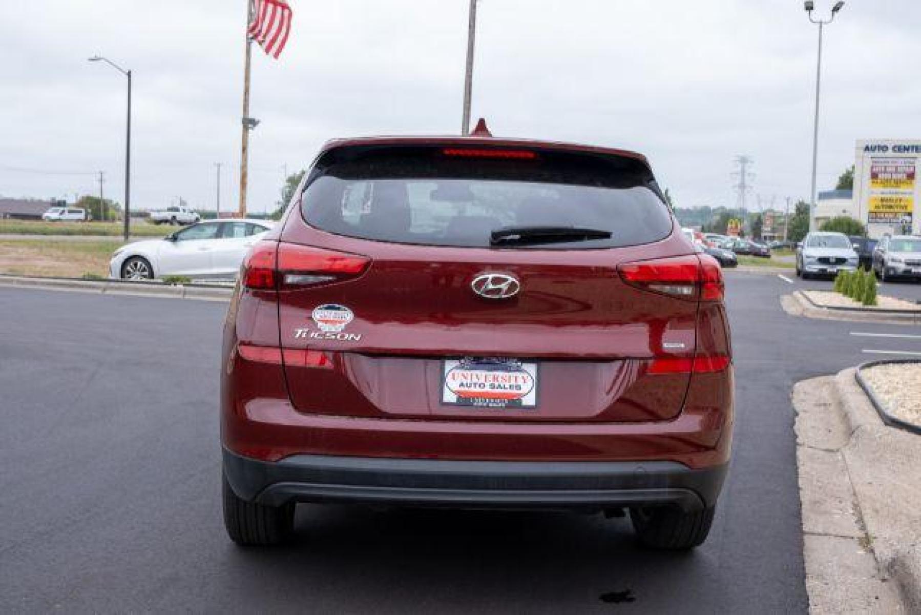 2020 Gemstone Red Hyundai Tucson SE AWD (KM8J2CA47LU) with an 2.0L L4 DOHC 16V engine, 6-Speed Automatic transmission, located at 3301 W Hwy 13, Burnsville, MN, 55337, (952) 460-3200, 44.775333, -93.320808 - Photo #2