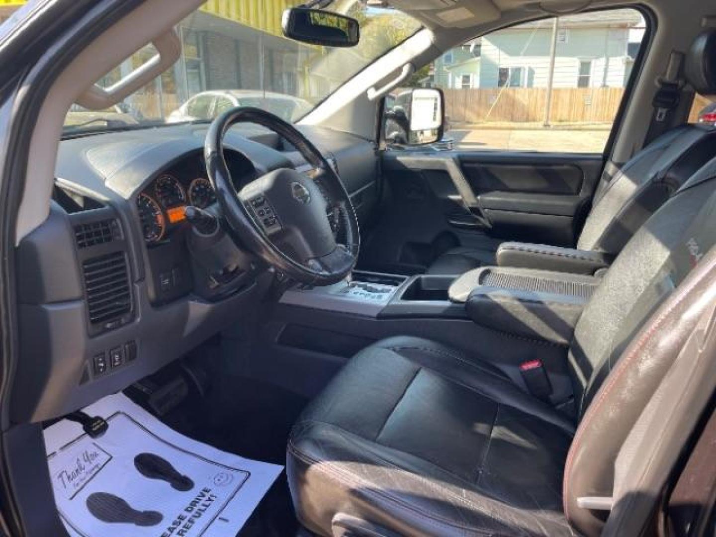 2012 Galaxy Black Metalli Nissan Titan PRO-4X Crew Cab 4WD (1N6AA0EC2CN) with an 5.6L V8 DOHC 32V engine, 5-Speed Automatic transmission, located at 745 S Robert St, St. Paul, MN, 55107, (651) 222-2991, 44.923389, -93.081215 - Photo#5