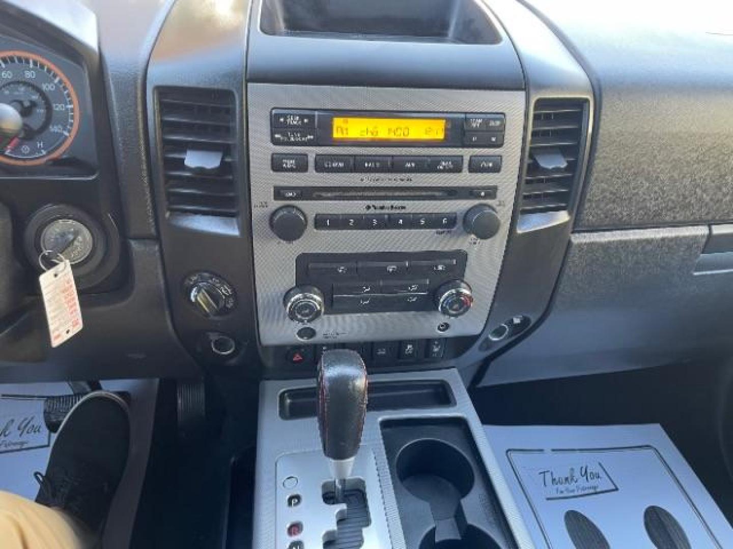 2012 Galaxy Black Metalli Nissan Titan PRO-4X Crew Cab 4WD (1N6AA0EC2CN) with an 5.6L V8 DOHC 32V engine, 5-Speed Automatic transmission, located at 745 S Robert St, St. Paul, MN, 55107, (651) 222-2991, 44.923389, -93.081215 - Photo#7