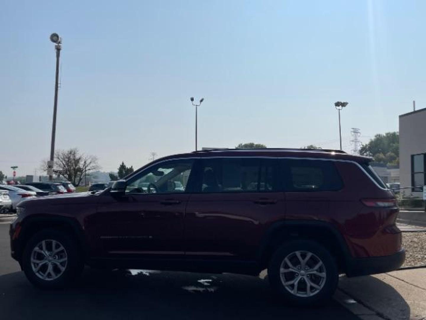 2021 Velvet Red Pearl Coat Jeep Grand Cherokee Limited 4WD (1C4RJKBG9M8) with an 3.6L V6 DOHC 24V engine, 8-Speed Automatic transmission, located at 3301 W Hwy 13, Burnsville, MN, 55337, (952) 460-3200, 44.775333, -93.320808 - Photo#2