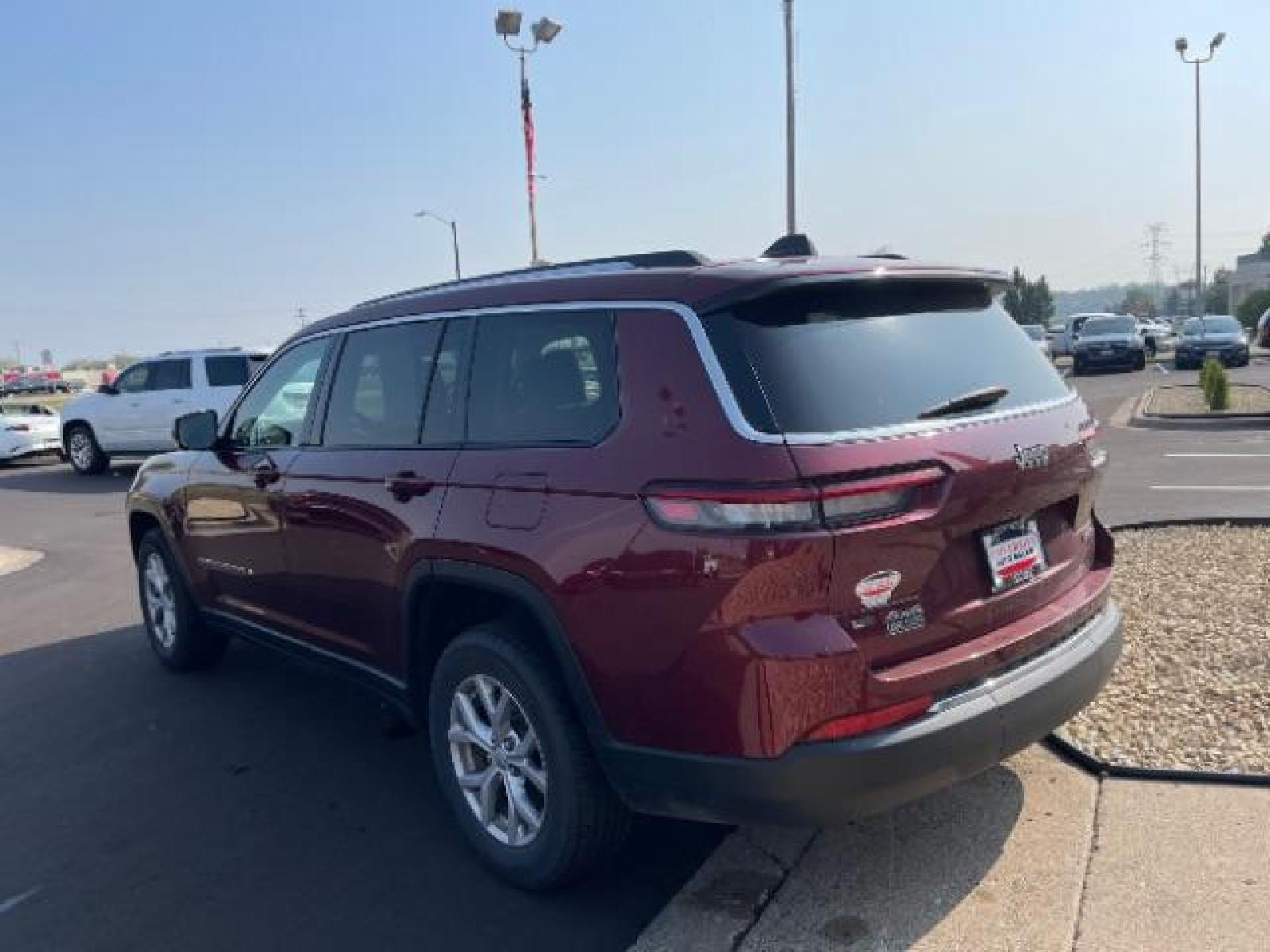 2021 Velvet Red Pearl Coat Jeep Grand Cherokee Limited 4WD (1C4RJKBG9M8) with an 3.6L V6 DOHC 24V engine, 8-Speed Automatic transmission, located at 3301 W Hwy 13, Burnsville, MN, 55337, (952) 460-3200, 44.775333, -93.320808 - Photo #3