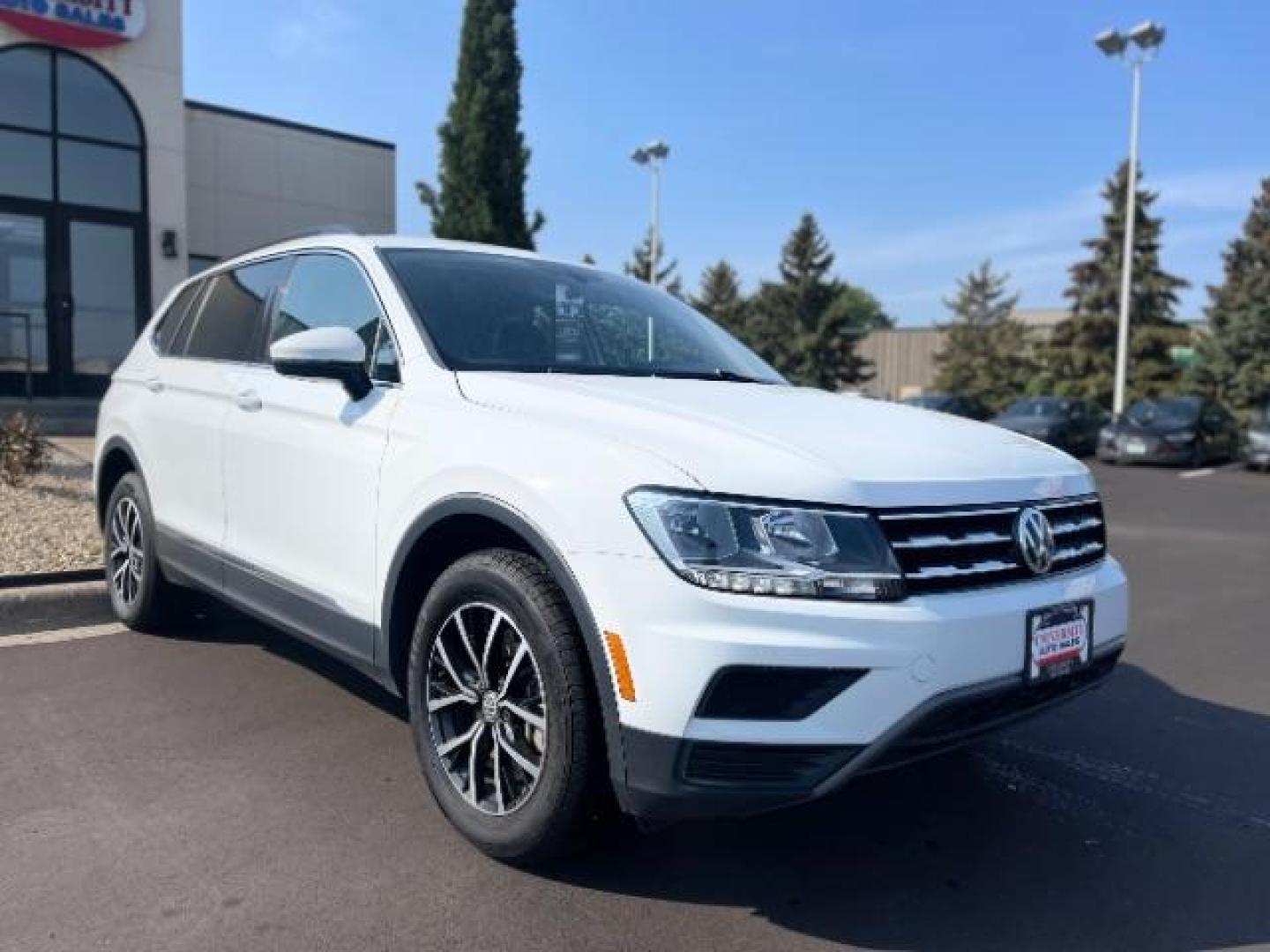 2021 Pure White Volkswagen Tiguan SE 4Motion (3VV2B7AX5MM) with an 2.0L L4 DOHC 16V TURBO engine, 8-Speed Automatic transmission, located at 745 S Robert St, St. Paul, MN, 55107, (651) 222-2991, 44.923389, -93.081215 - Photo#0