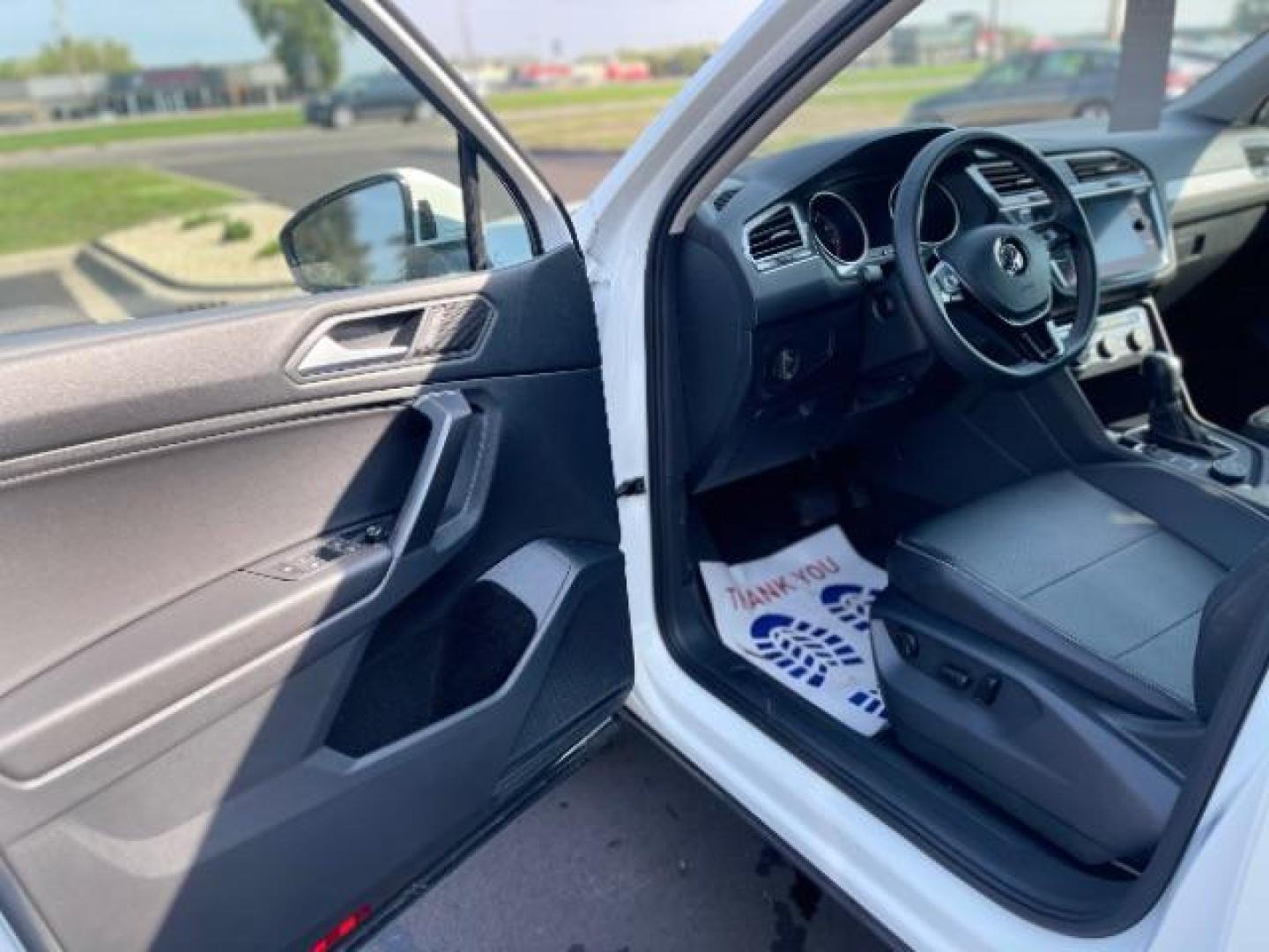 2021 Pure White Volkswagen Tiguan SE 4Motion (3VV2B7AX5MM) with an 2.0L L4 DOHC 16V TURBO engine, 8-Speed Automatic transmission, located at 745 S Robert St, St. Paul, MN, 55107, (651) 222-2991, 44.923389, -93.081215 - Photo#9