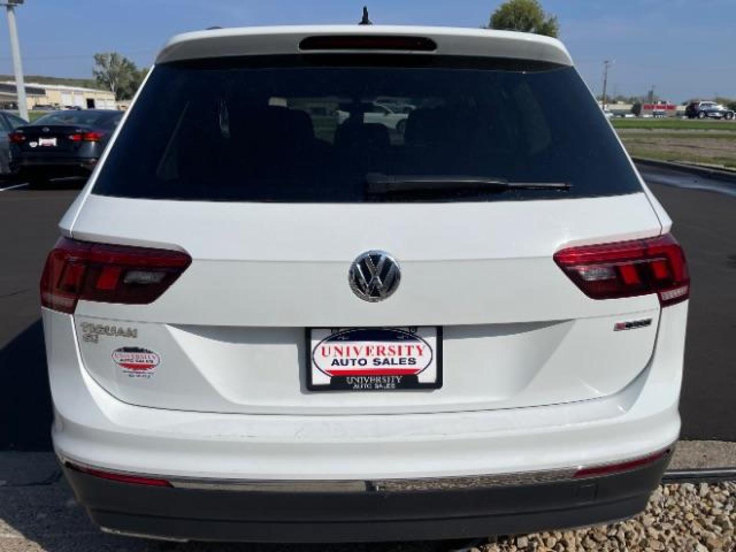 2021 Pure White Volkswagen Tiguan SE 4Motion (3VV2B7AX5MM) with an 2.0L L4 DOHC 16V TURBO engine, 8-Speed Automatic transmission, located at 745 S Robert St, St. Paul, MN, 55107, (651) 222-2991, 44.923389, -93.081215 - Photo#3