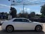 2013 Bright White Chrysler 300 S V6 RWD (2C3CCABG8DH) with an 3.6L V6 DOHC 24V engine, 8-Speed Automatic transmission, located at 745 S Robert St, St. Paul, MN, 55107, (651) 222-2991, 44.923389, -93.081215 - Photo#5