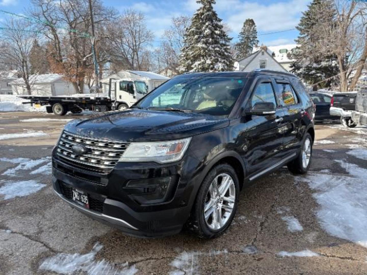 2016 Absolute Black Ford Explorer Limited 4WD (1FM5K8FH5GG) with an 2.3L L4 DOHC 16V engine, 6-Speed Automatic transmission, located at 745 S Robert St, St. Paul, MN, 55107, (651) 222-2991, 44.923389, -93.081215 - Photo#1