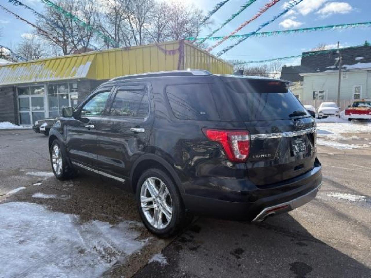 2016 Absolute Black Ford Explorer Limited 4WD (1FM5K8FH5GG) with an 2.3L L4 DOHC 16V engine, 6-Speed Automatic transmission, located at 745 S Robert St, St. Paul, MN, 55107, (651) 222-2991, 44.923389, -93.081215 - Photo#2