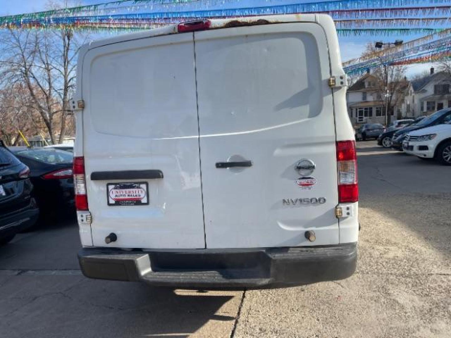 2015 Glacier White Nissan NV Cargo 1500 S (1N6BF0KL1FN) with an 4.0L V6 engine, 5-Speed Automatic transmission, located at 3301 W Hwy 13, Burnsville, MN, 55337, (952) 460-3200, 44.775333, -93.320808 - Photo#3