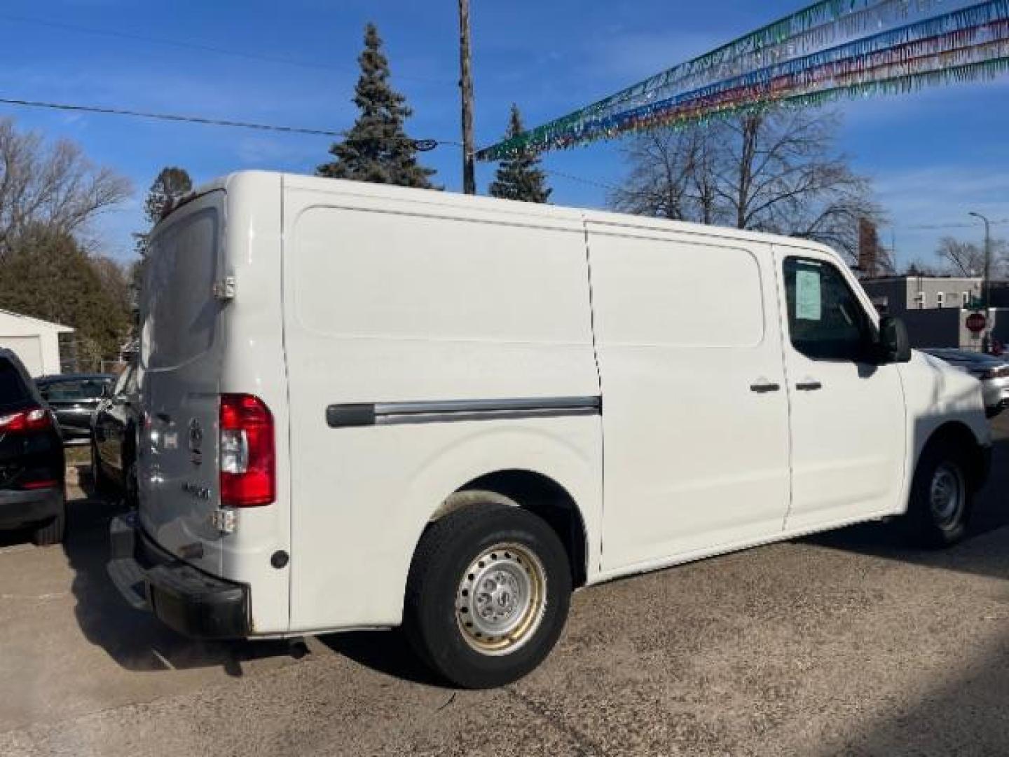 2015 Glacier White Nissan NV Cargo 1500 S (1N6BF0KL1FN) with an 4.0L V6 engine, 5-Speed Automatic transmission, located at 3301 W Hwy 13, Burnsville, MN, 55337, (952) 460-3200, 44.775333, -93.320808 - Photo#4