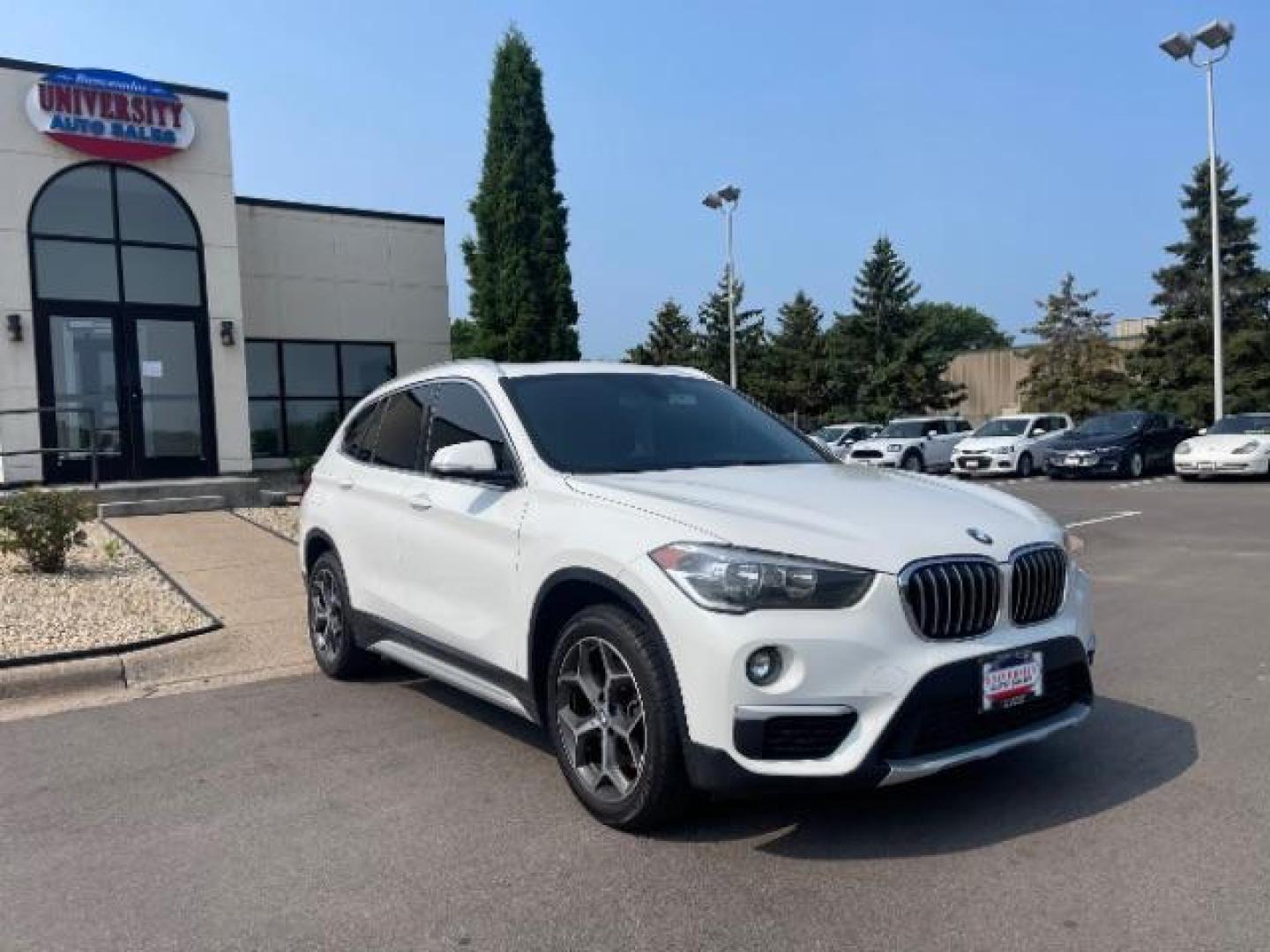 2018 Alpine White BMW X1 xDrive28i (WBXHT3C31J5) with an 2.0L L4 DOHC 16V engine, 8-Speed Automatic transmission, located at 745 S Robert St, St. Paul, MN, 55107, (651) 222-2991, 44.923389, -93.081215 - Photo#0