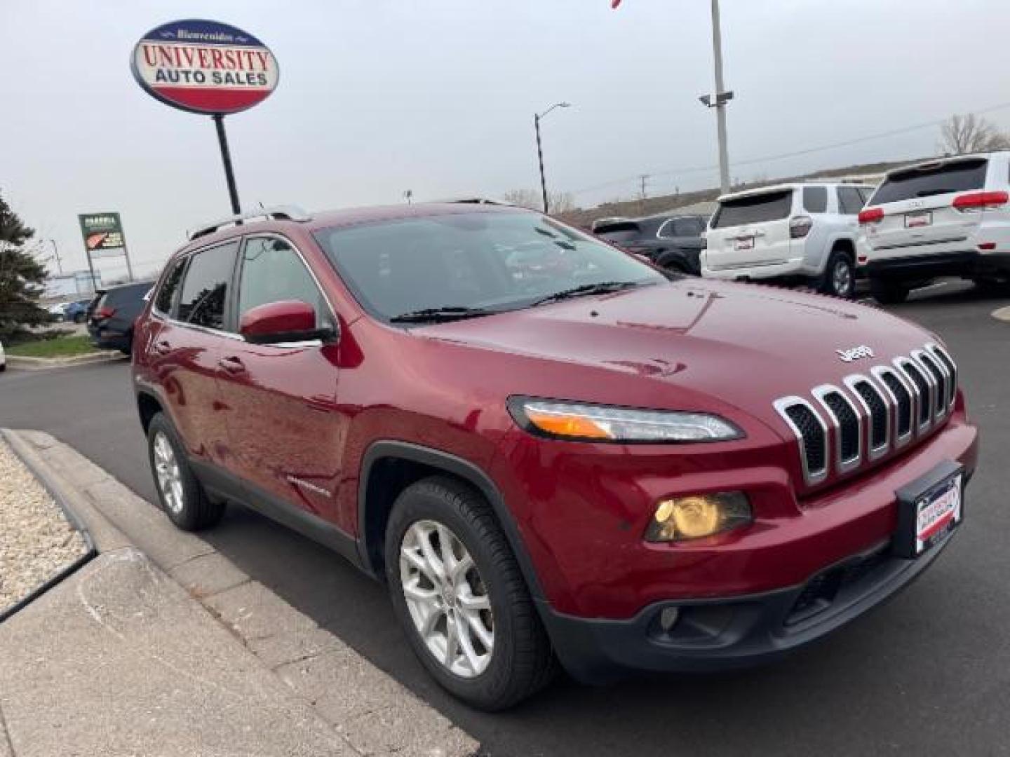 2016 Deep Cherry Red Crystal Pearl Coat Jeep Cherokee Latitude FWD (1C4PJLCB1GW) with an 2.4L L4 DOHC 16V engine, 9-Speed Automatic transmission, located at 3301 W Hwy 13, Burnsville, MN, 55337, (952) 460-3200, 44.775333, -93.320808 - Photo#7