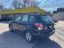 2018 Crystal Black Silica Subaru Forester 2.5i PZEV CVT (JF2SJAAC9JH) with an 2.5L H4 SOHC 16V engine, Continuously Variable Transmission transmission, located at 745 S Robert St, St. Paul, MN, 55107, (651) 222-2991, 44.923389, -93.081215 - Photo#2