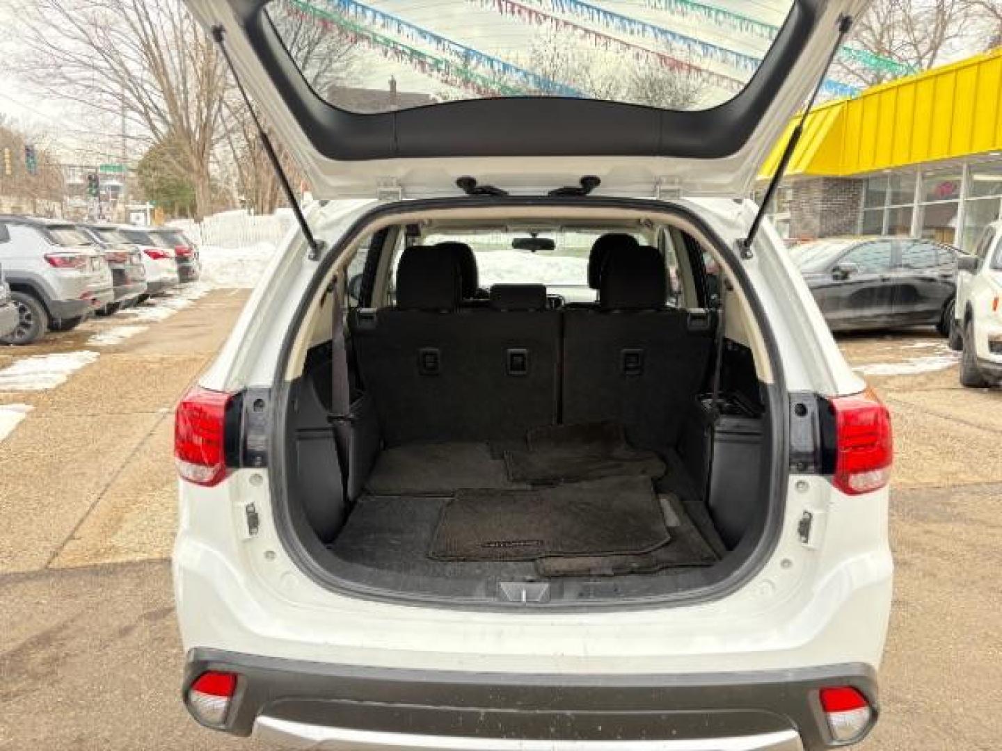 2016 Diamond White Mitsubishi Outlander SE AWD (JA4AZ3A32GZ) with an 2.4L L4 DOHC 16V engine, Continuously Variabl transmission, located at 745 S Robert St, St. Paul, MN, 55107, (651) 222-2991, 44.923389, -93.081215 - Photo#4