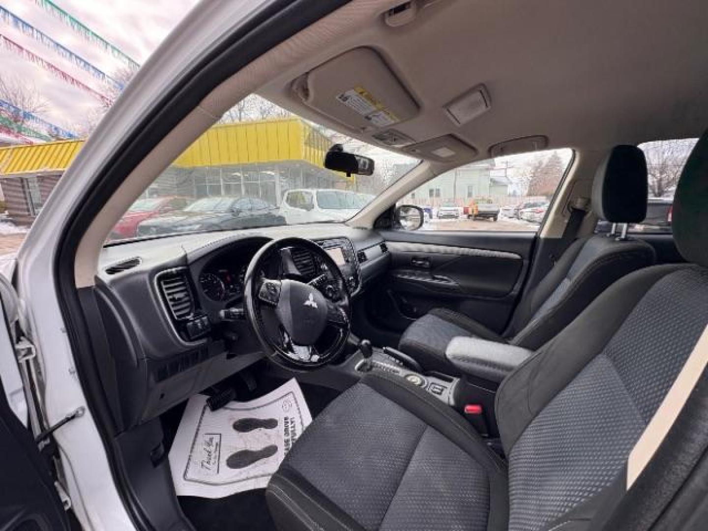 2016 Diamond White Mitsubishi Outlander SE AWD (JA4AZ3A32GZ) with an 2.4L L4 DOHC 16V engine, Continuously Variabl transmission, located at 745 S Robert St, St. Paul, MN, 55107, (651) 222-2991, 44.923389, -93.081215 - Photo#6