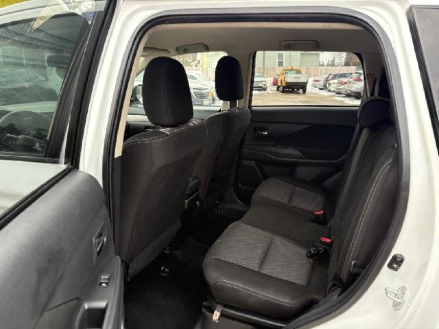 2016 Diamond White Mitsubishi Outlander SE AWD (JA4AZ3A32GZ) with an 2.4L L4 DOHC 16V engine, Continuously Variabl transmission, located at 745 S Robert St, St. Paul, MN, 55107, (651) 222-2991, 44.923389, -93.081215 - Photo#11