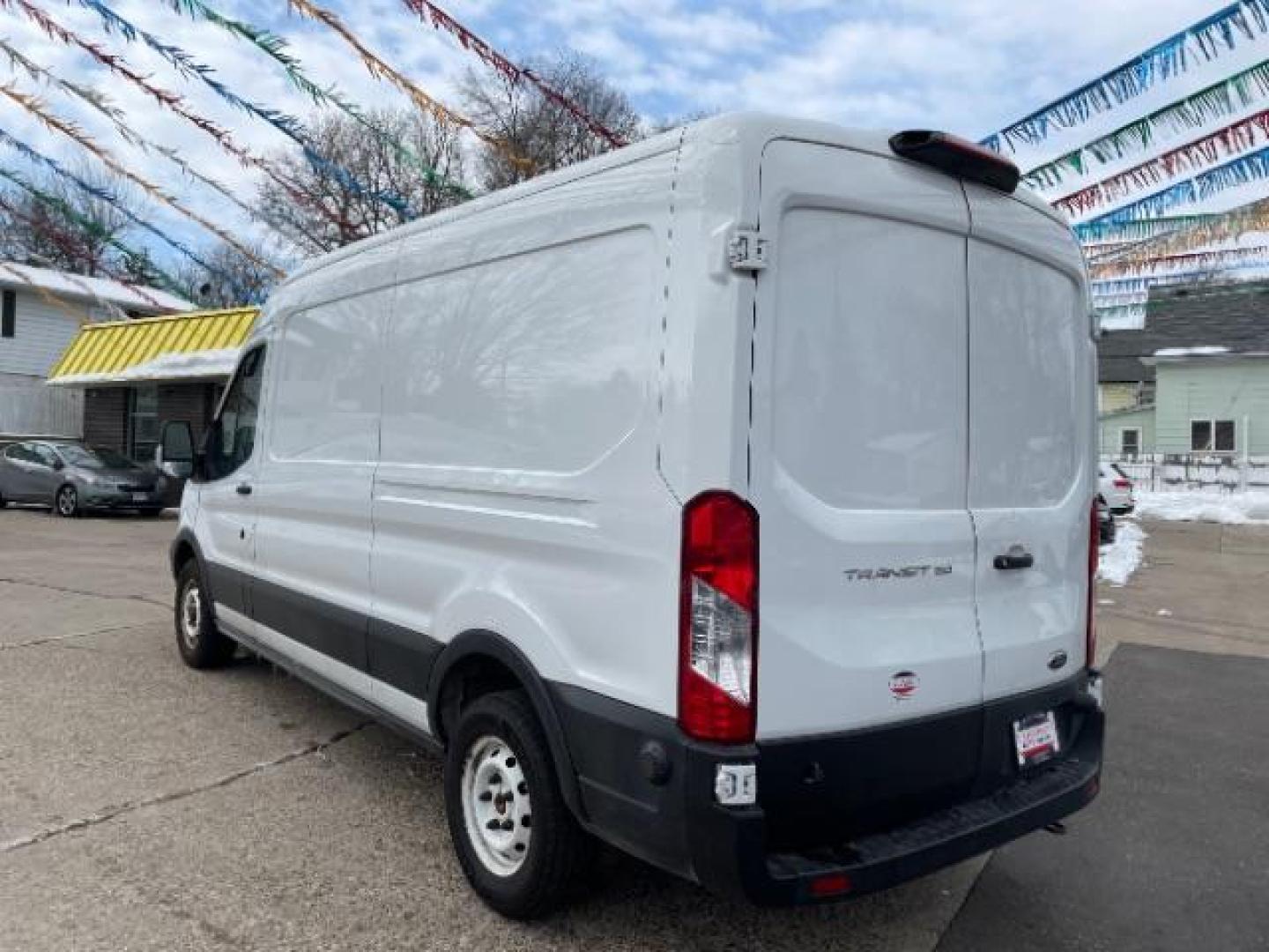 2019 WHITE Ford Transit 150 Van Med. Roof w/Sliding Pass. 148-in. WB (1FTYE2CM2KK) with an 3.7L V6 DOHC 24V engine, 6-Speed Automatic transmission, located at 3301 W Hwy 13, Burnsville, MN, 55337, (952) 460-3200, 44.775333, -93.320808 - Photo#2