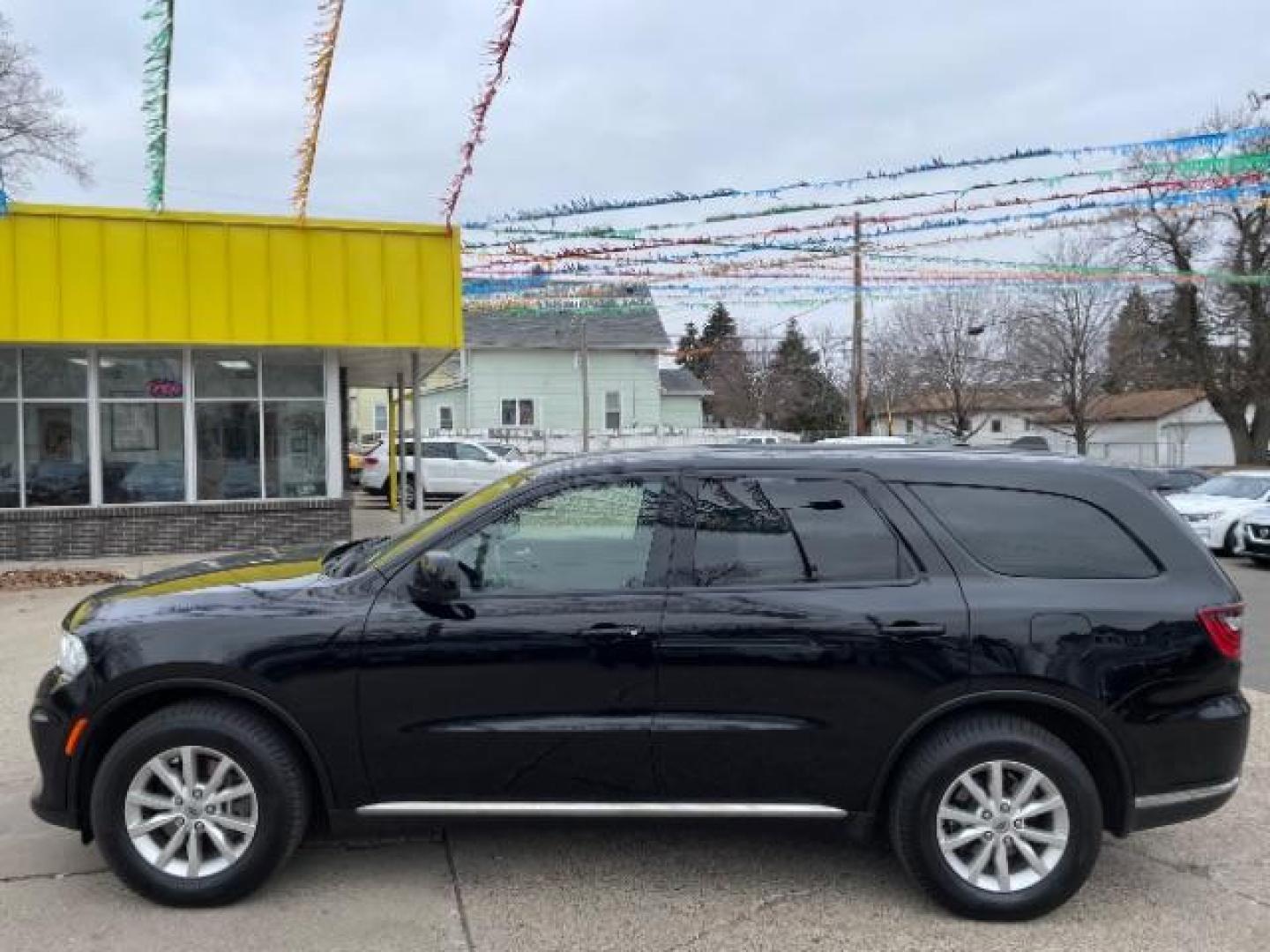 2021 Diamond Black Clear Coat Dodge Durango SXT AWD (1C4RDJAG5MC) with an 3.6L V6 DOHC 24V engine, 8-Speed Automatic transmission, located at 745 S Robert St, St. Paul, MN, 55107, (651) 222-2991, 44.923389, -93.081215 - Photo#1