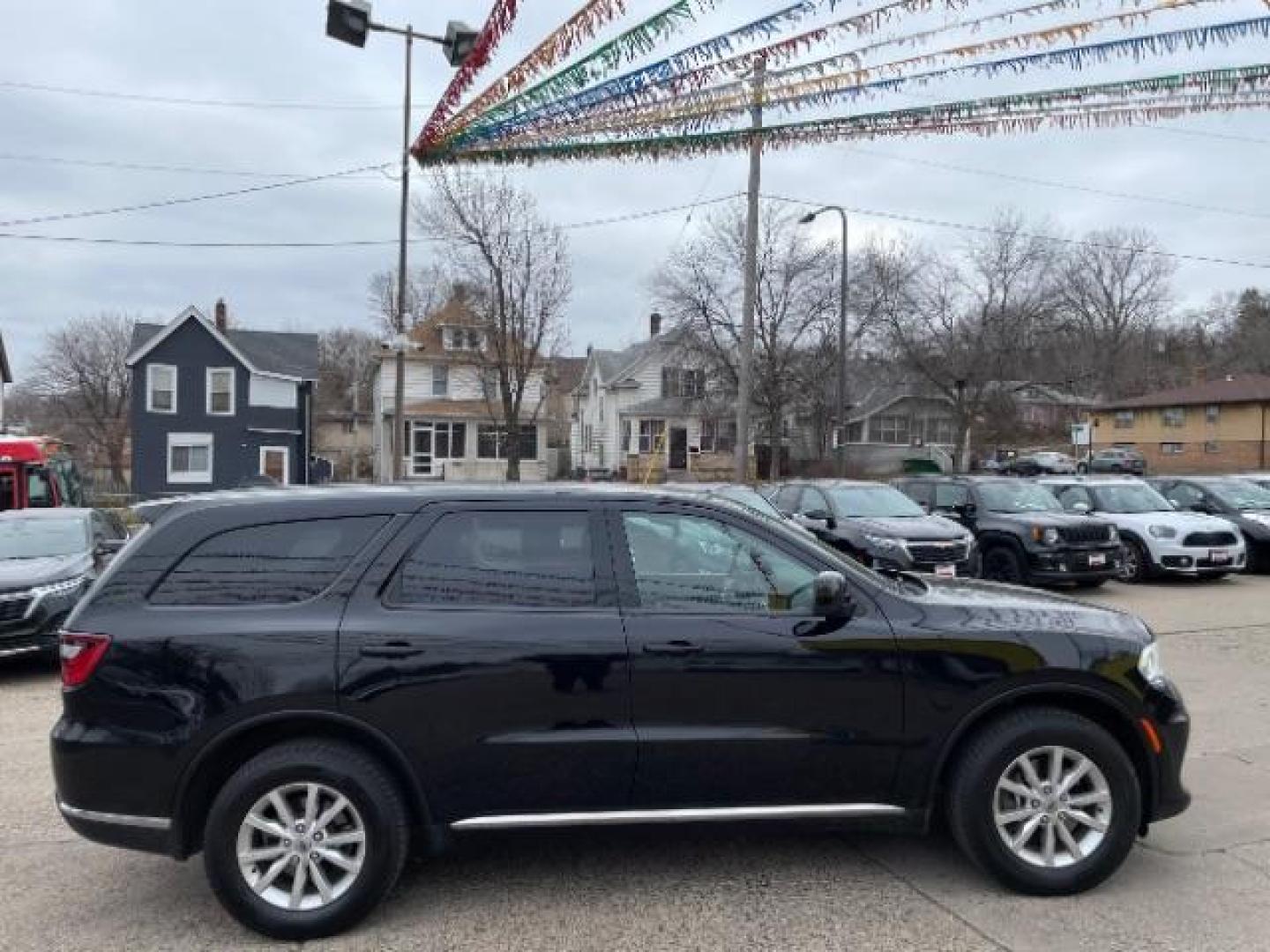 2021 Diamond Black Clear Coat Dodge Durango SXT AWD (1C4RDJAG5MC) with an 3.6L V6 DOHC 24V engine, 8-Speed Automatic transmission, located at 745 S Robert St, St. Paul, MN, 55107, (651) 222-2991, 44.923389, -93.081215 - Photo#5