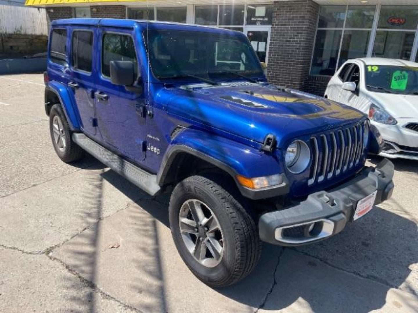 2019 BLUE Jeep Wrangler Unlimited Sahara (1C4HJXEGXKW) with an 3.6L V6 DOHC 24V FFV engine, 6-Speed Manual transmission, located at 3301 W Hwy 13, Burnsville, MN, 55337, (952) 460-3200, 44.775333, -93.320808 - Photo#2