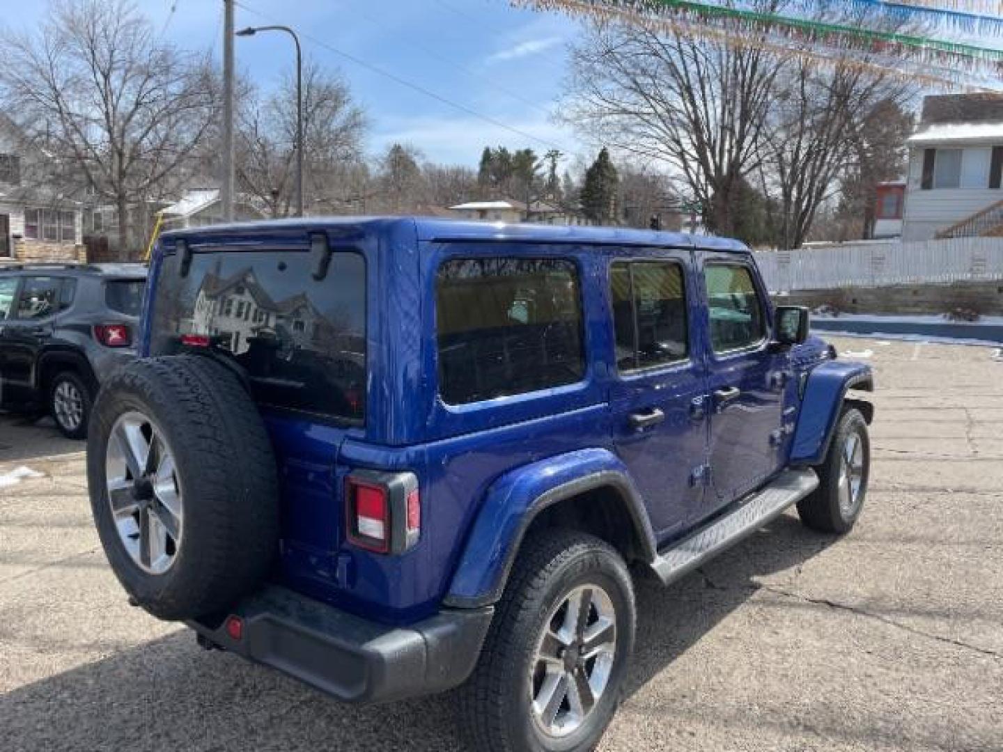 2019 BLUE Jeep Wrangler Unlimited Sahara (1C4HJXEGXKW) with an 3.6L V6 DOHC 24V FFV engine, 6-Speed Manual transmission, located at 745 S Robert St, St. Paul, MN, 55107, (651) 222-2991, 44.923389, -93.081215 - Photo#4