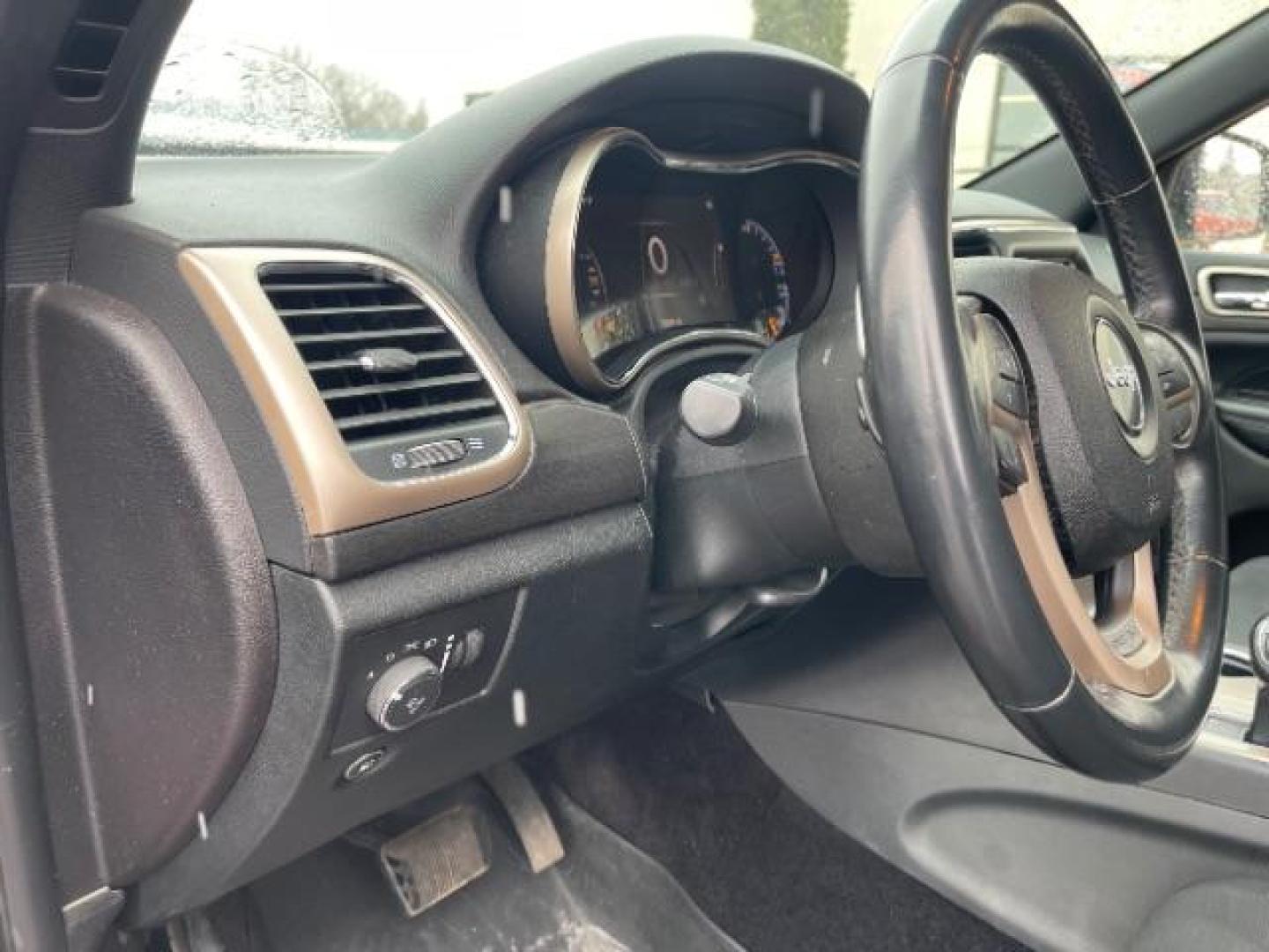 2015 Dp Cherry Red Crystal PC Jeep Grand Cherokee Laredo 4WD (1C4RJFAG2FC) with an 3.6L V6 DOHC 24V engine, 8-Speed Automatic transmission, located at 3301 W Hwy 13, Burnsville, MN, 55337, (952) 460-3200, 44.775333, -93.320808 - Photo#17