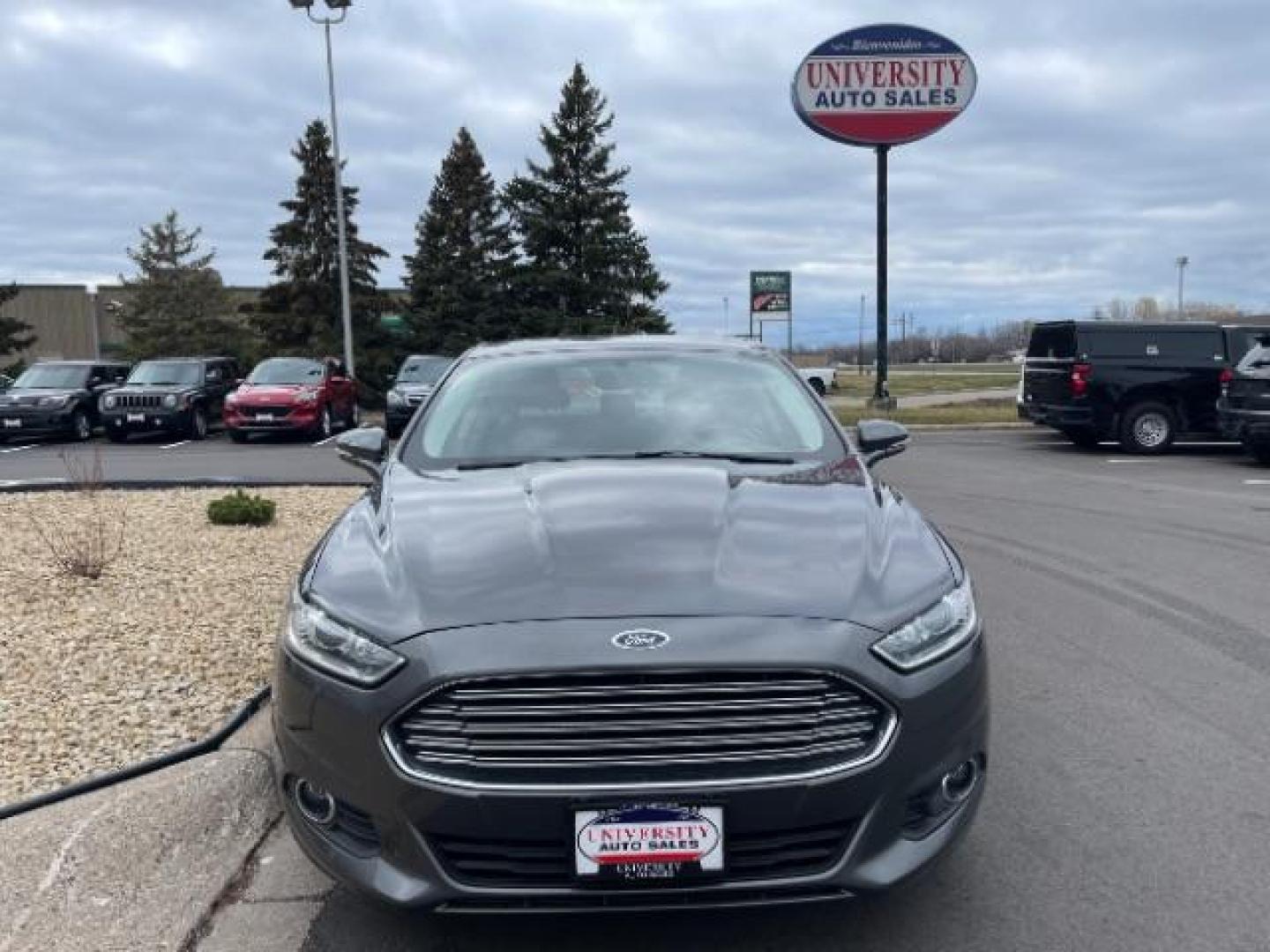 2015 GRAY Ford Fusion SE (3FA6P0HD4FR) with an 1.5L L4 DOHC 16V engine, 6-Speed Automatic transmission, located at 3301 W Hwy 13, Burnsville, MN, 55337, (952) 460-3200, 44.775333, -93.320808 - Photo#0