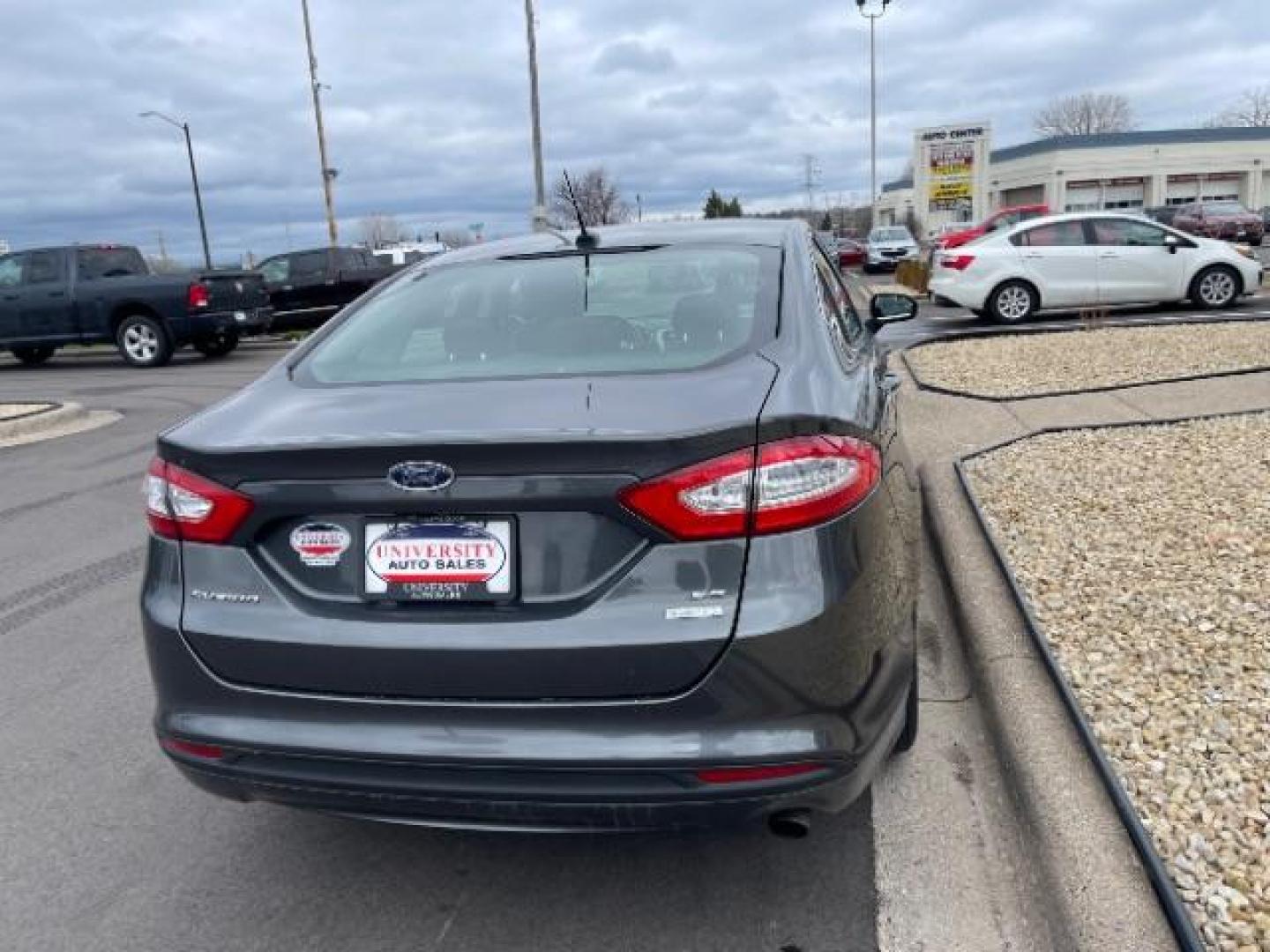 2015 GRAY Ford Fusion SE (3FA6P0HD4FR) with an 1.5L L4 DOHC 16V engine, 6-Speed Automatic transmission, located at 3301 W Hwy 13, Burnsville, MN, 55337, (952) 460-3200, 44.775333, -93.320808 - Photo#3