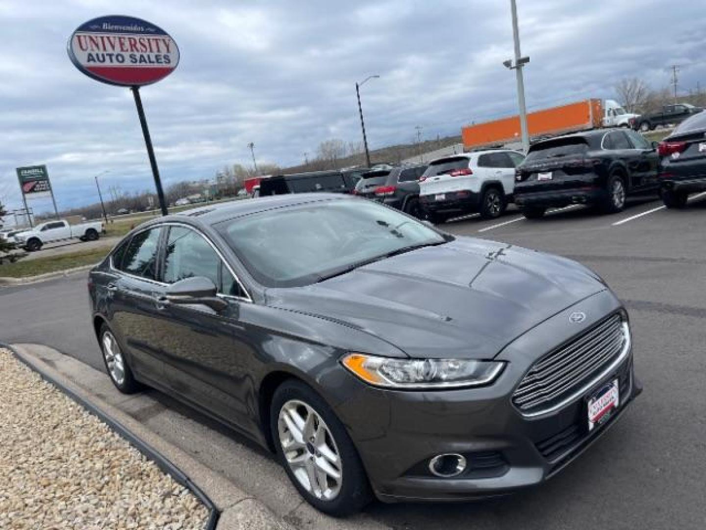 2015 GRAY Ford Fusion SE (3FA6P0HD4FR) with an 1.5L L4 DOHC 16V engine, 6-Speed Automatic transmission, located at 3301 W Hwy 13, Burnsville, MN, 55337, (952) 460-3200, 44.775333, -93.320808 - Photo#7