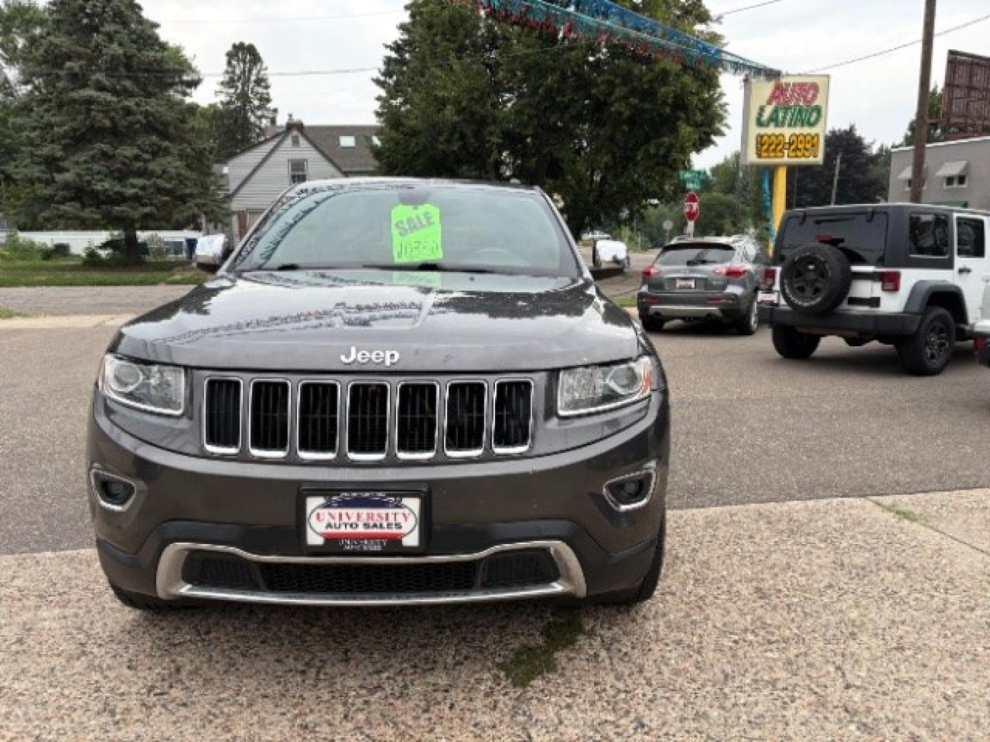 2014 Maximum Steel Metall Jeep Grand Cherokee Limited 4WD (1C4RJFBG0EC) with an 3.6L V6 DOHC 24V engine, 5-Speed Automatic transmission, located at 745 S Robert St, St. Paul, MN, 55107, (651) 222-2991, 44.923389, -93.081215- Photo#1